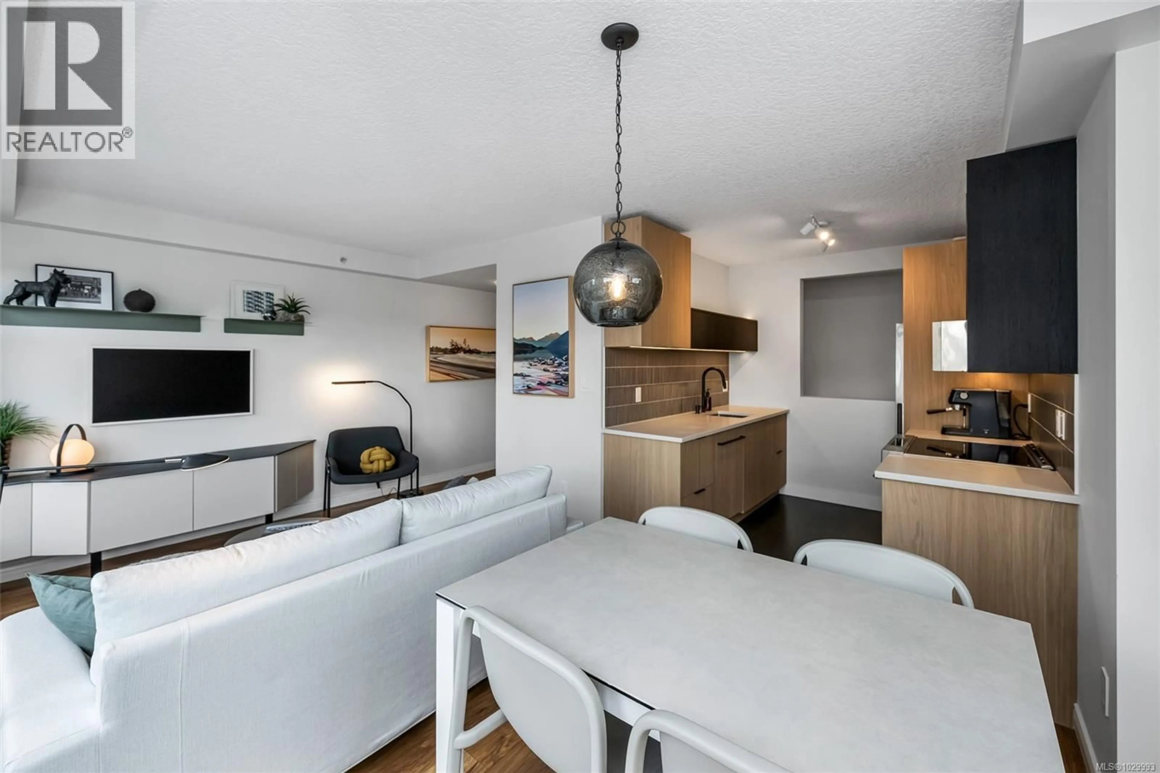 Open concept kitchen, wood/laminate floor for 509 - 1030 YATES STREET, Victoria British Columbia V8V5A7