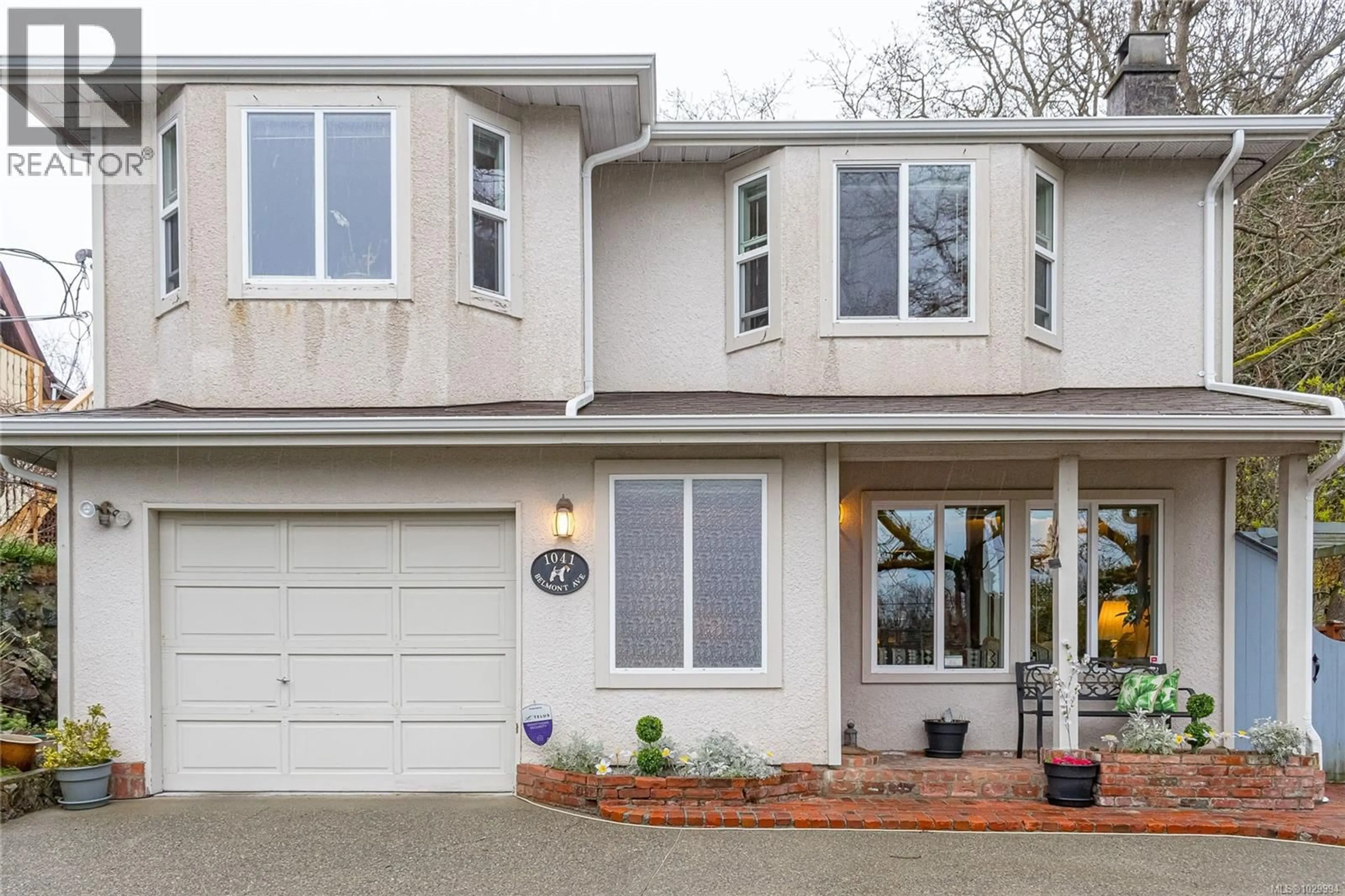 Home with vinyl exterior material, street for 1041 BELMONT AVENUE, Victoria British Columbia V8S3T4