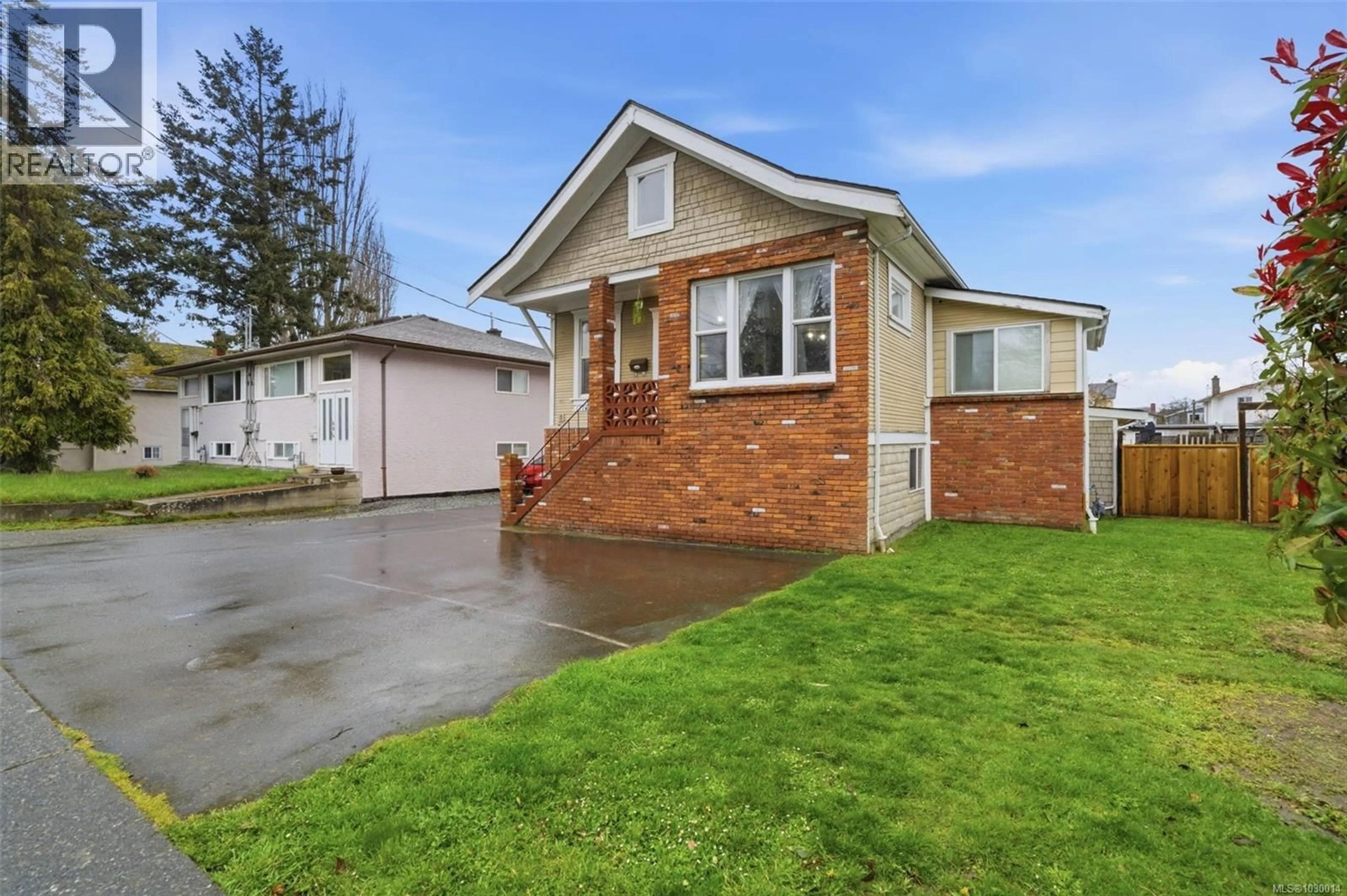 Home with vinyl exterior material, street for 1776 MCKENZIE AVENUE, Saanich British Columbia V8N1A7