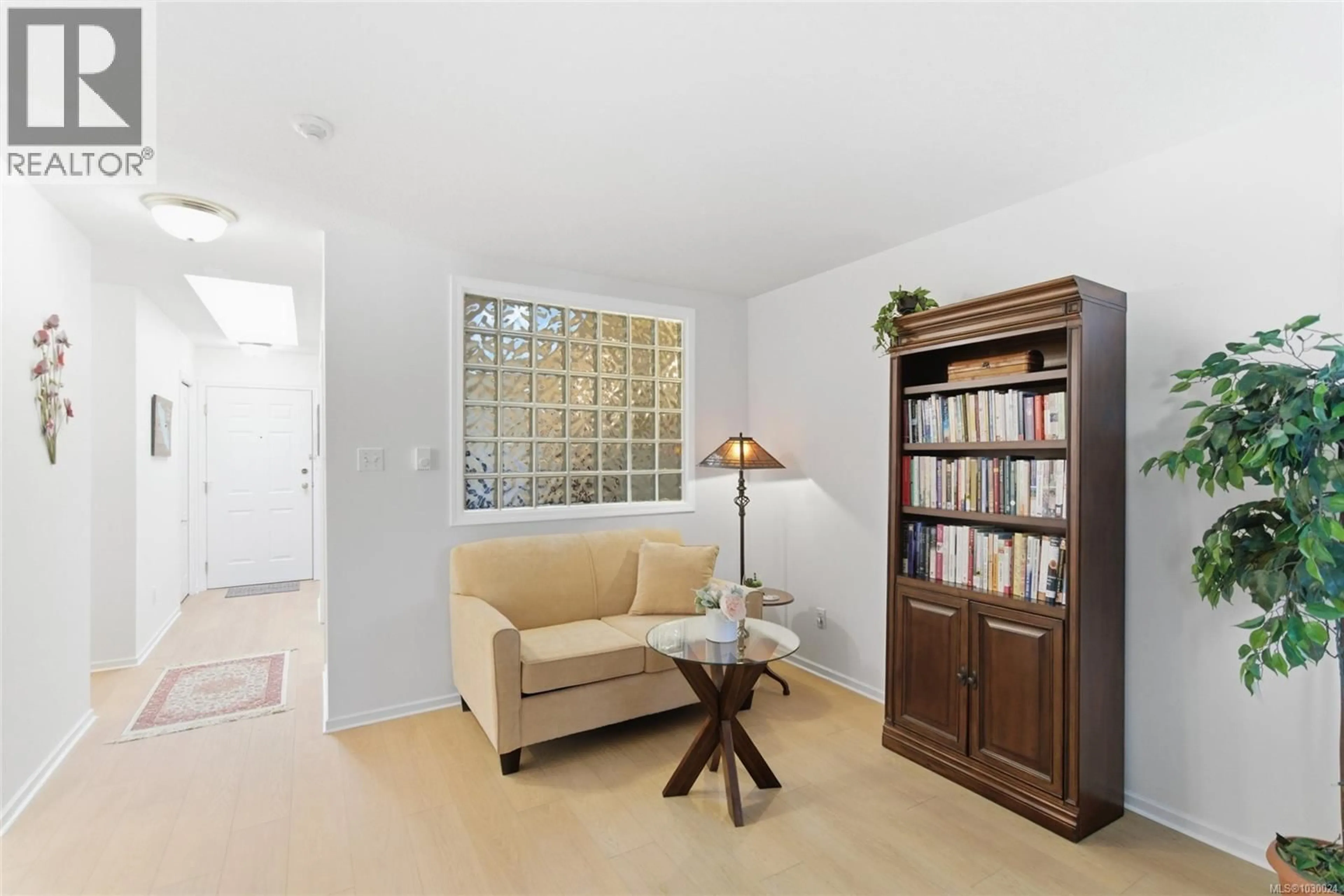 Living room with furniture, unknown for 203 - 440 SCHLEY PLACE, Qualicum Beach British Columbia V9K2M5