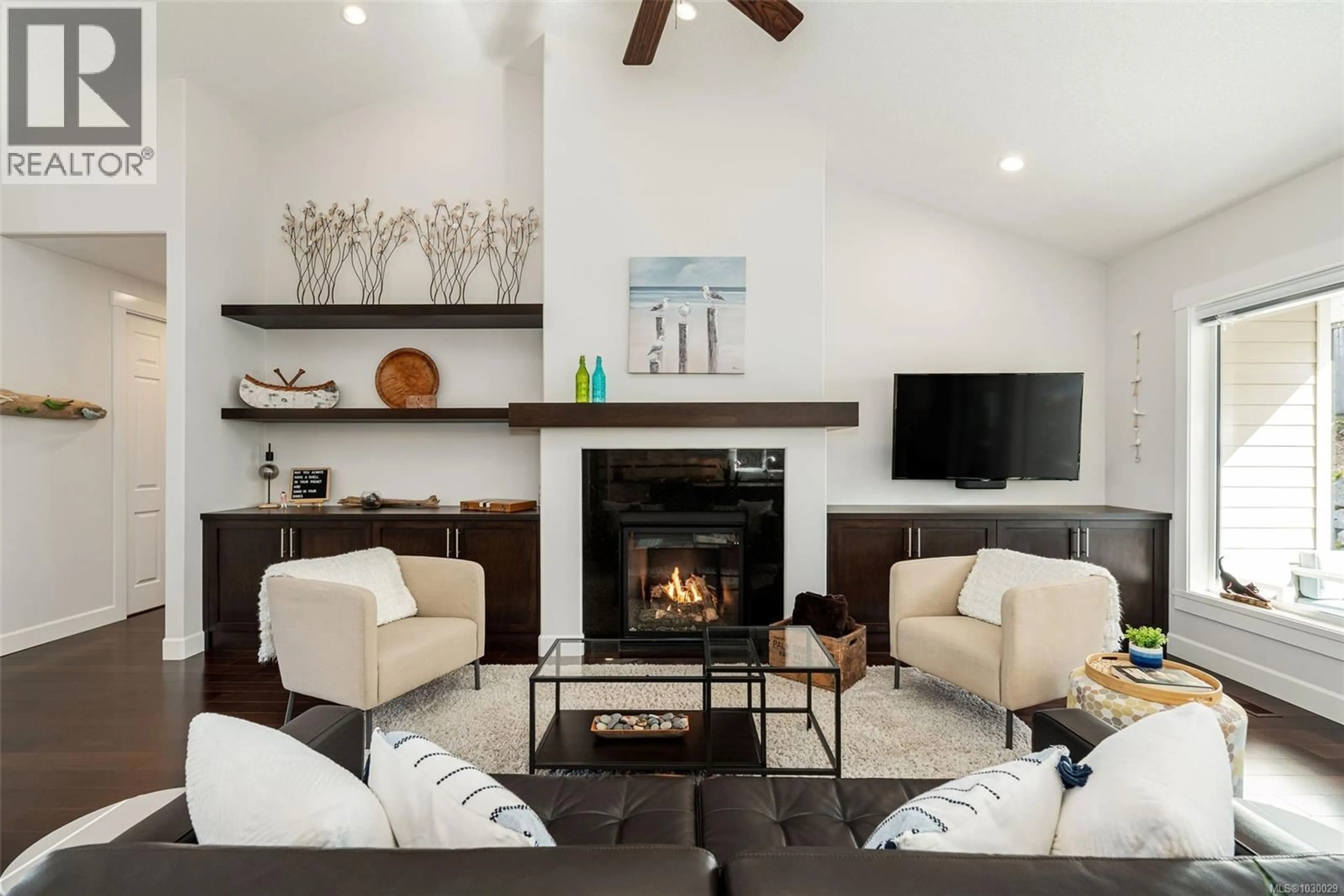 Living room with furniture, unknown for 174 SUNNINGDALE ROAD EAST, Qualicum Beach British Columbia V9K1L1