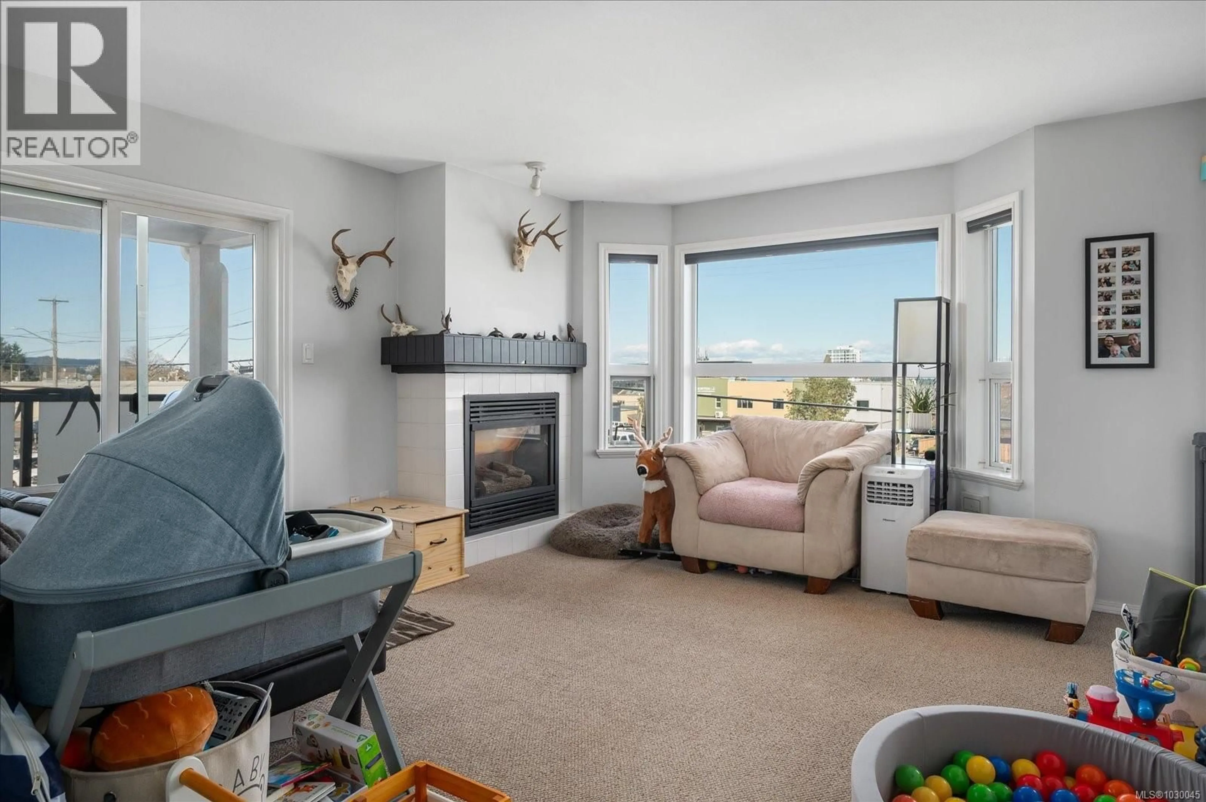 Living room with furniture, unknown for 304 - 327 PRIDEAUX STREET, Nanaimo British Columbia V9R2N4