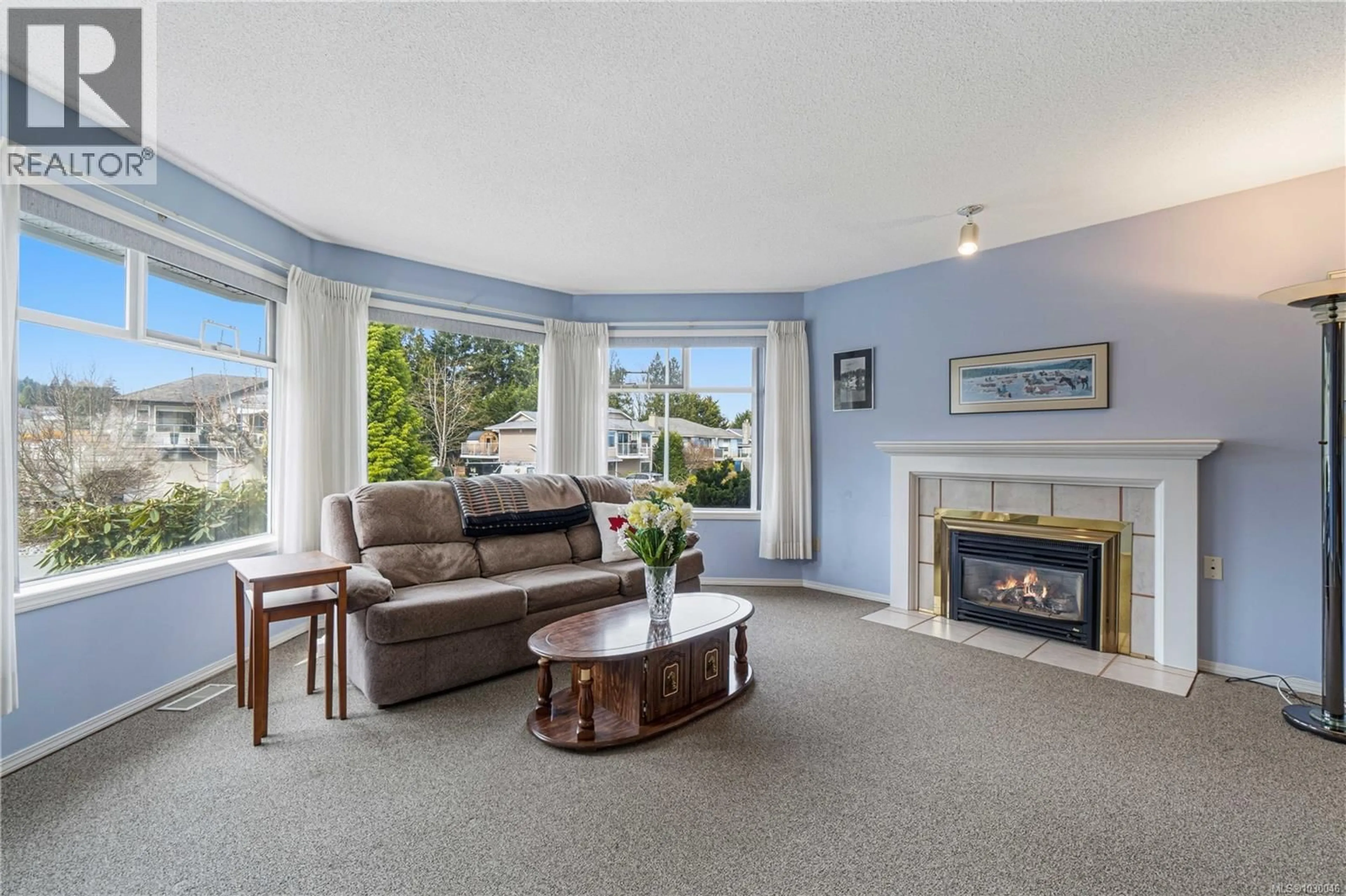 Living room with furniture, unknown for 5351 FILLINGER CRESCENT, Nanaimo British Columbia V9V1H6