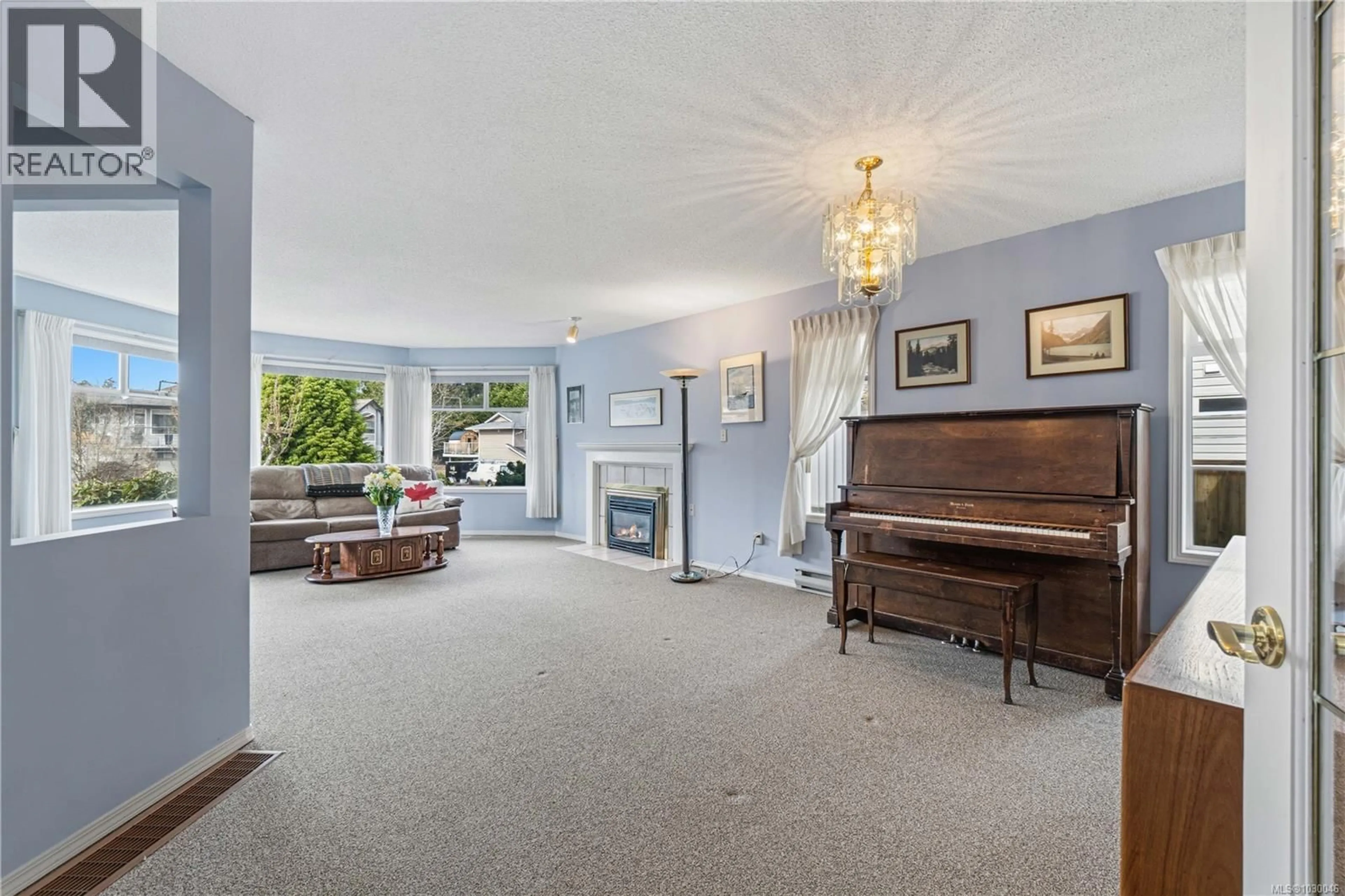 Living room with furniture, unknown for 5351 FILLINGER CRESCENT, Nanaimo British Columbia V9V1H6