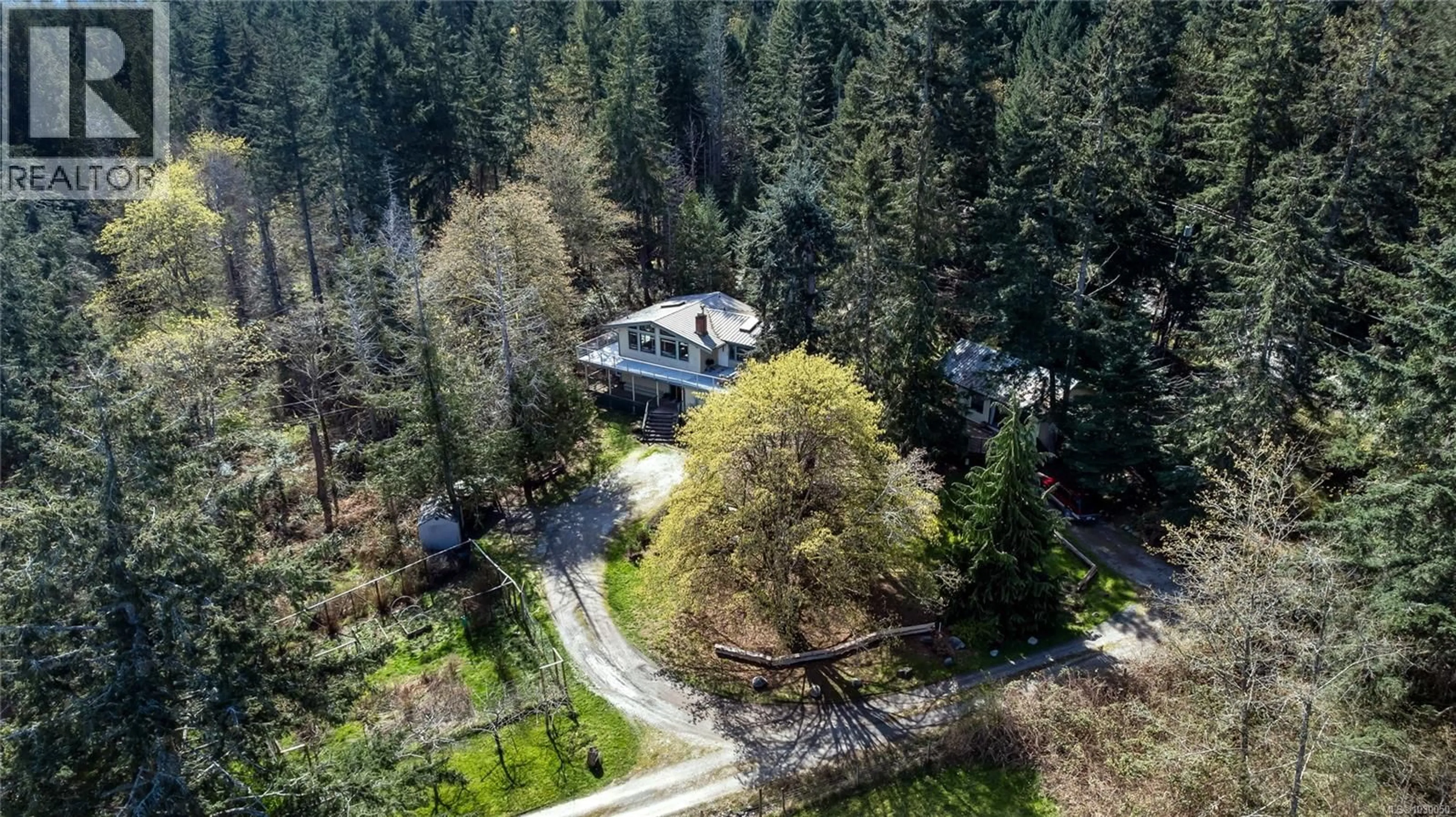 A pic from outside/outdoor area/front of a property/back of a property/a pic from drone, forest/trees view for 2083 NORTH END ROAD, Salt Spring British Columbia V8K1E1