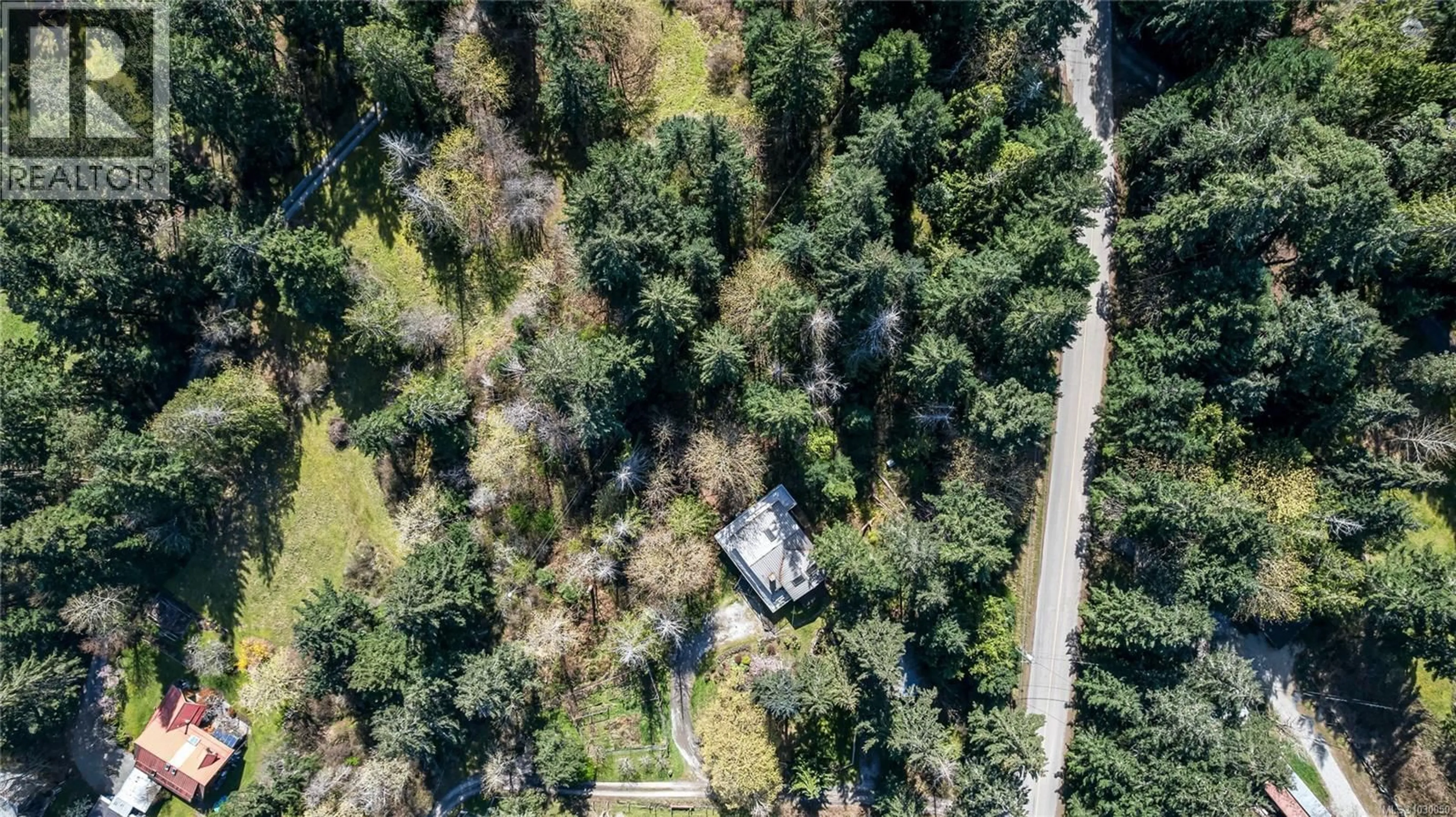 A pic from outside/outdoor area/front of a property/back of a property/a pic from drone, forest/trees view for 2083 NORTH END ROAD, Salt Spring British Columbia V8K1E1