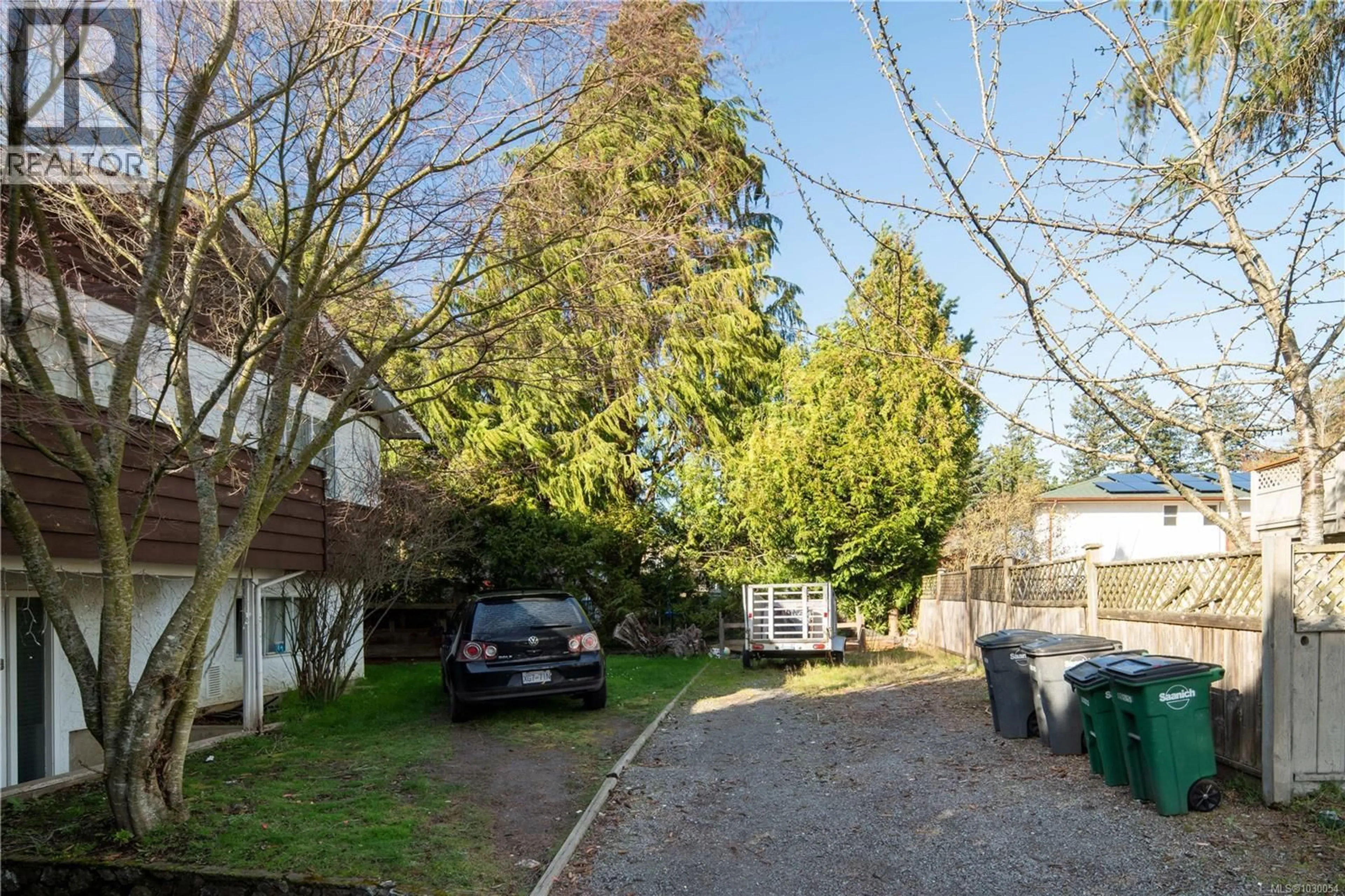 A pic from outside/outdoor area/front of a property/back of a property/a pic from drone, street for 1619 LONGACRE DRIVE, Saanich British Columbia V8W3W3
