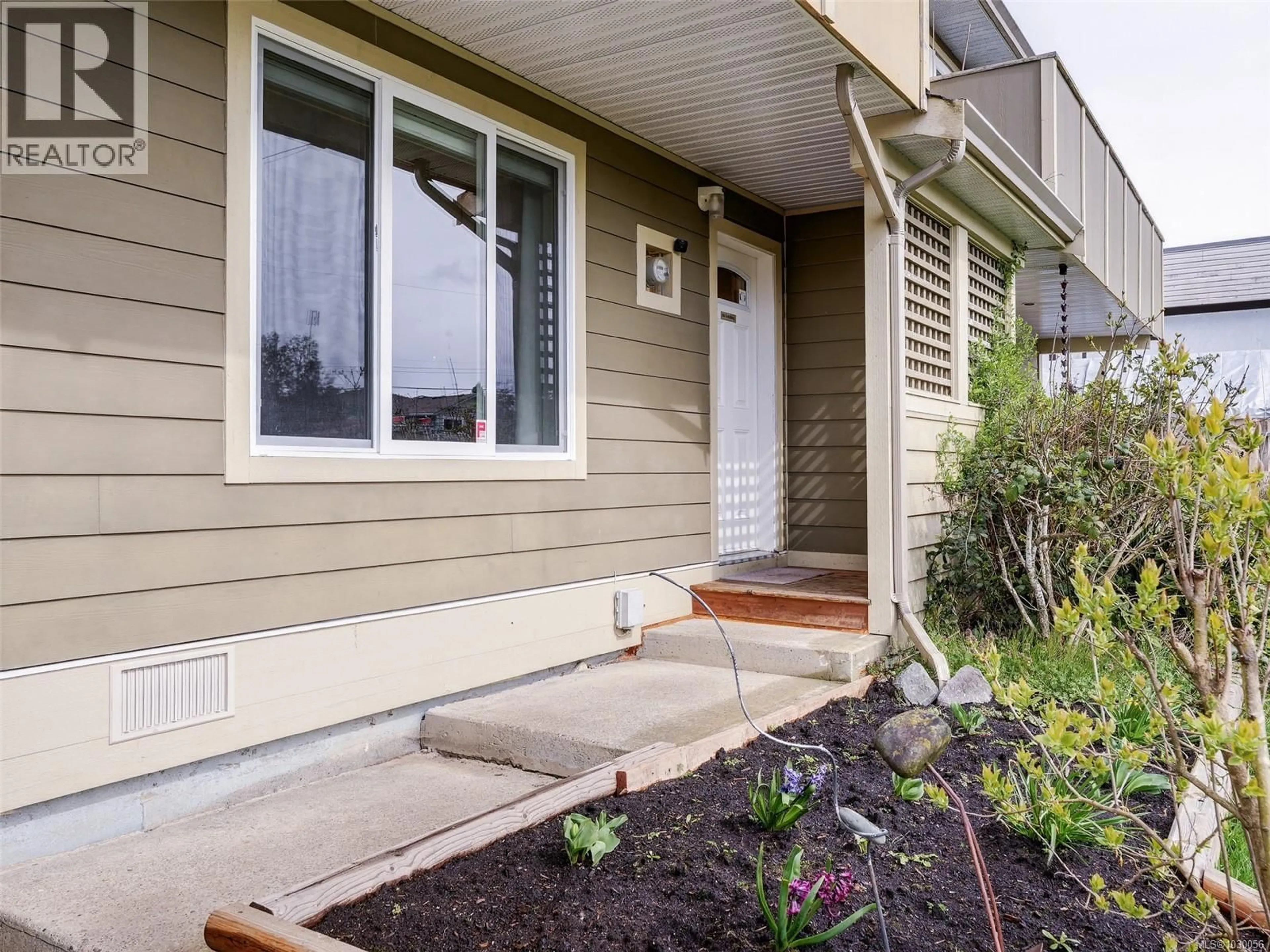 Home with vinyl exterior material, street for 2035 MELVILLE DRIVE, Sidney British Columbia V0R1S1