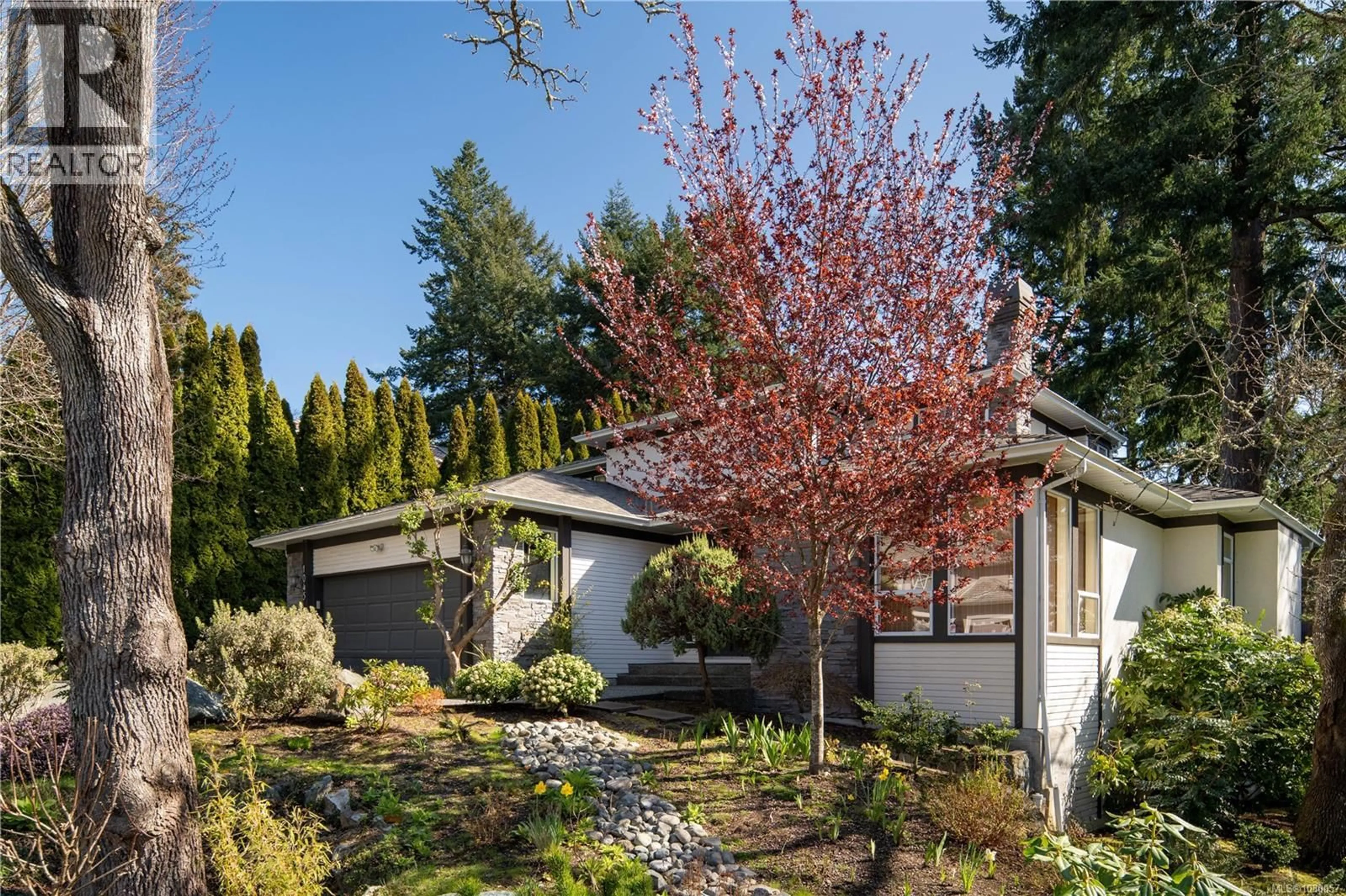 Home with brick exterior material, street for 1045 VALEWOOD TRAIL, Saanich British Columbia V8X5G7