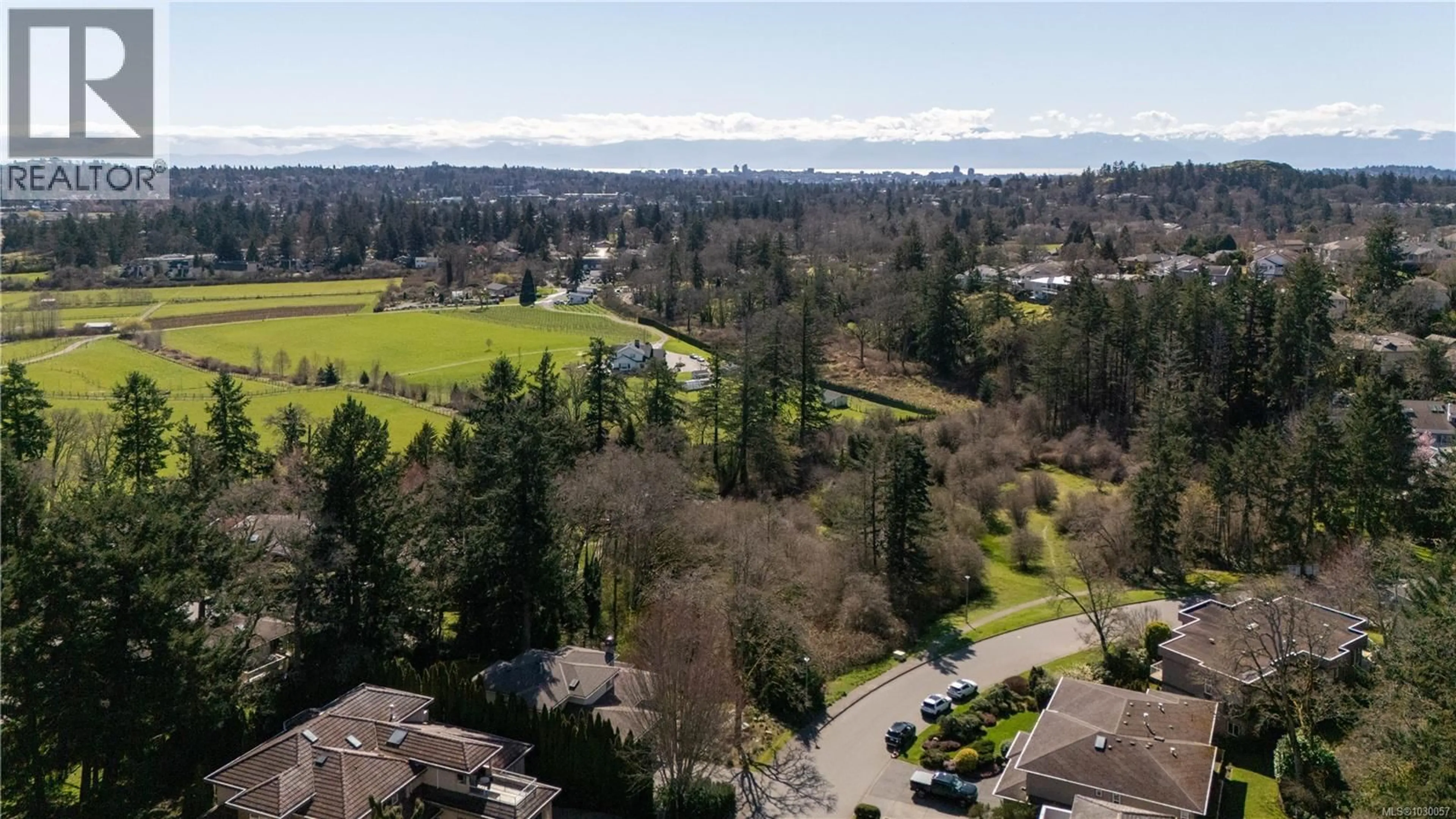 A pic from outside/outdoor area/front of a property/back of a property/a pic from drone, unknown for 1045 VALEWOOD TRAIL, Saanich British Columbia V8X5G7