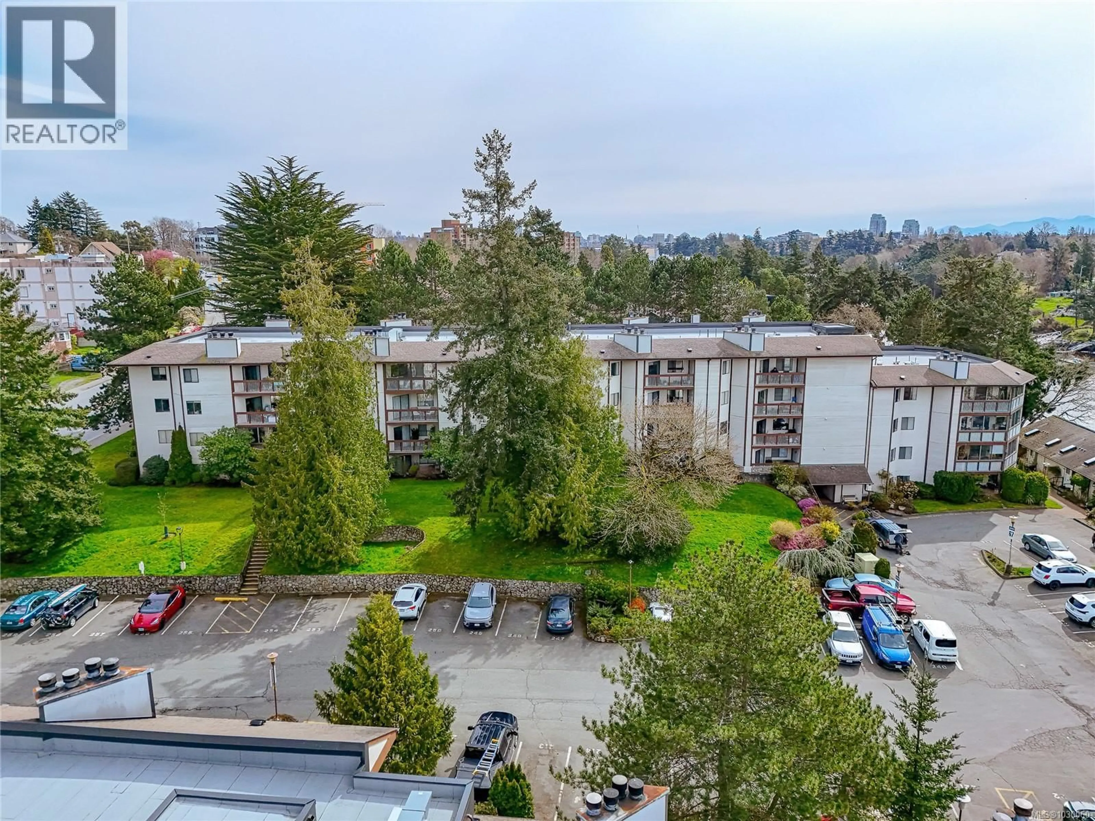 A pic from outside/outdoor area/front of a property/back of a property/a pic from drone, city buildings view from balcony for 203 - 69 GORGE ROAD WEST, Saanich British Columbia V9A1L9
