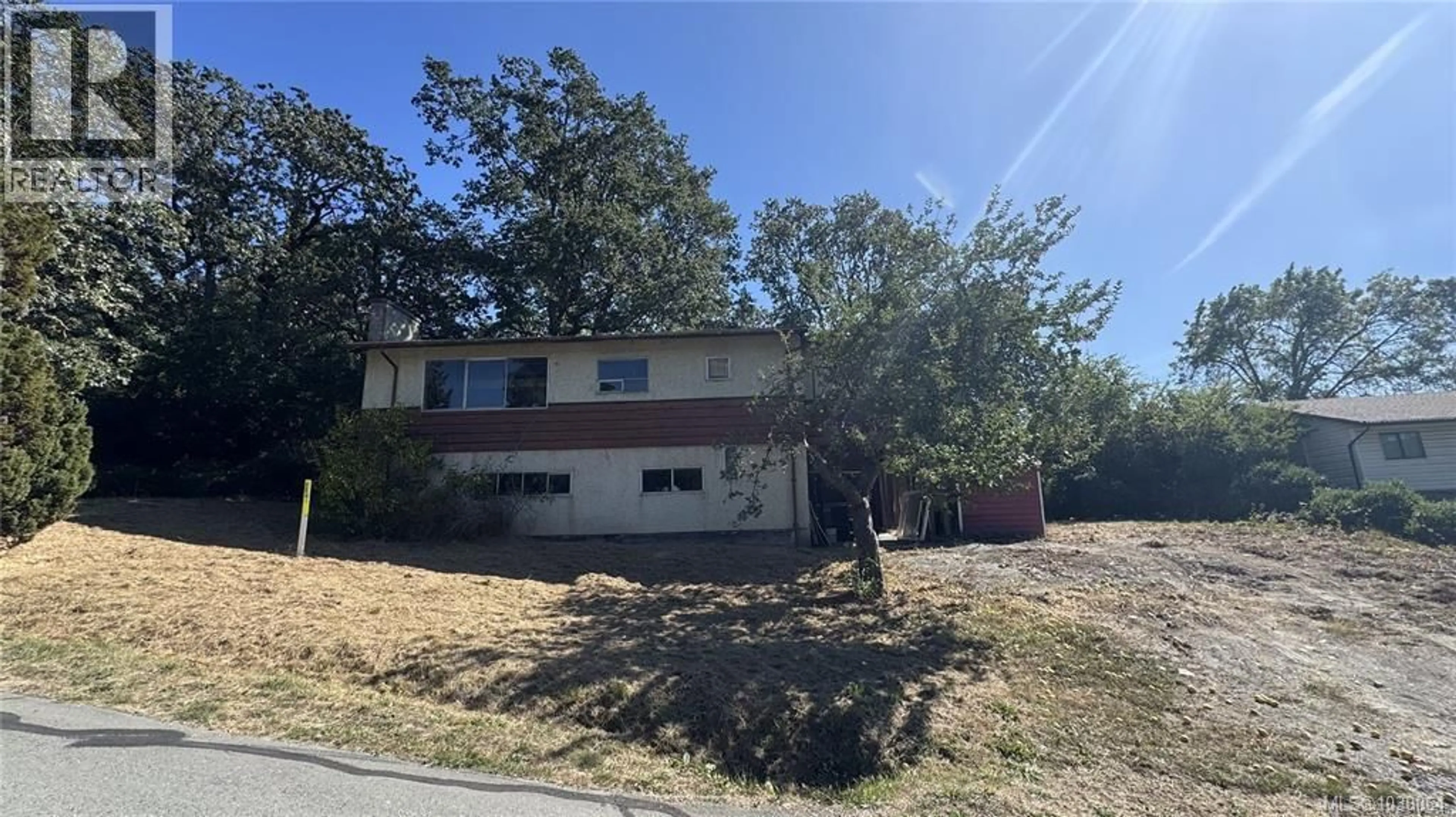 A pic from outside/outdoor area/front of a property/back of a property/a pic from drone, street for 1279 BURNSIDE ROAD WEST, View Royal British Columbia V8Z1P3