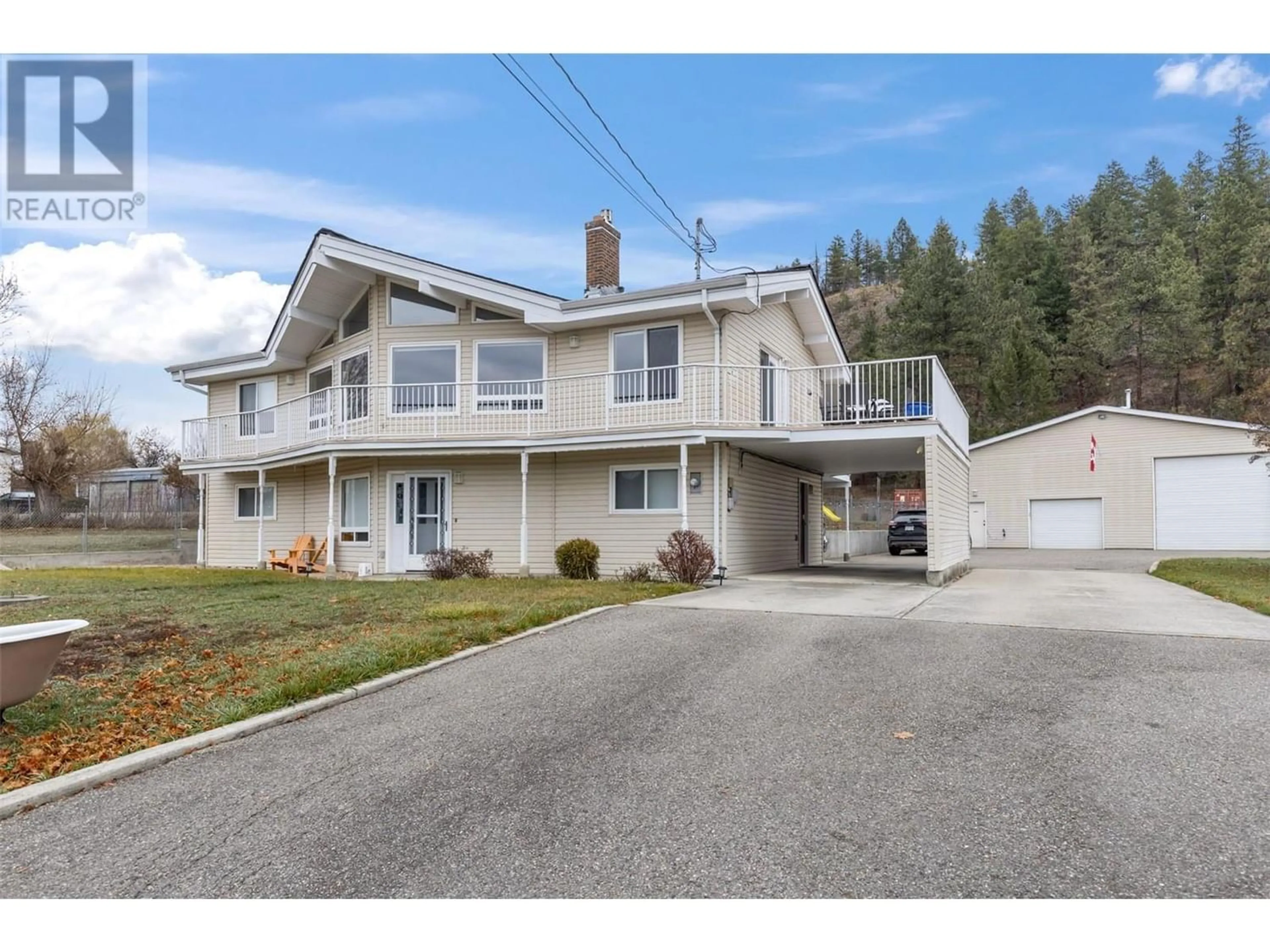 Frontside or backside of a home for 535 Curtis Road, Kelowna British Columbia V1V2G6