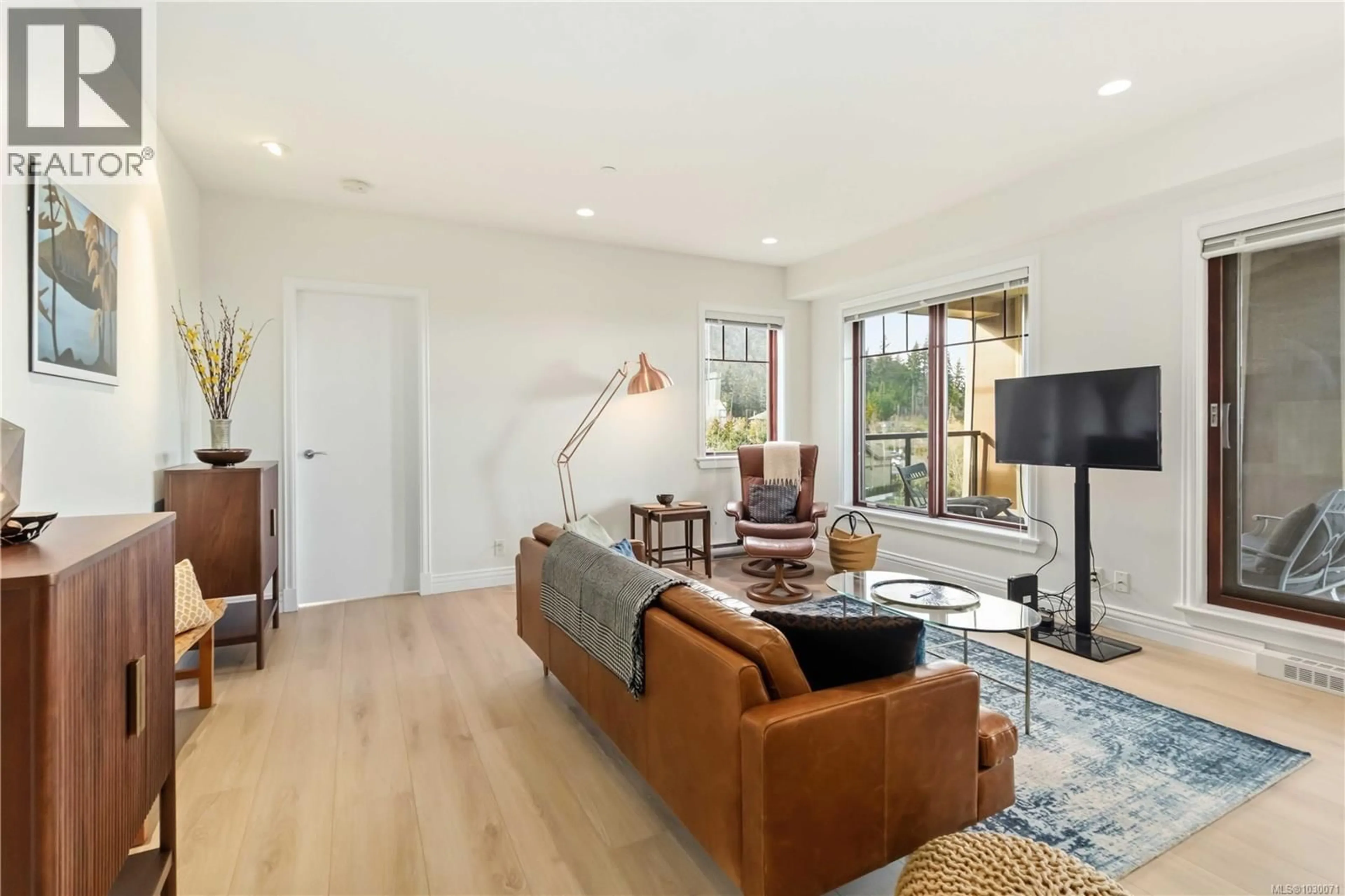 Living room with furniture, unknown for 311 - 1325 BEAR MOUNTAIN PARKWAY, Langford British Columbia V9B6T8