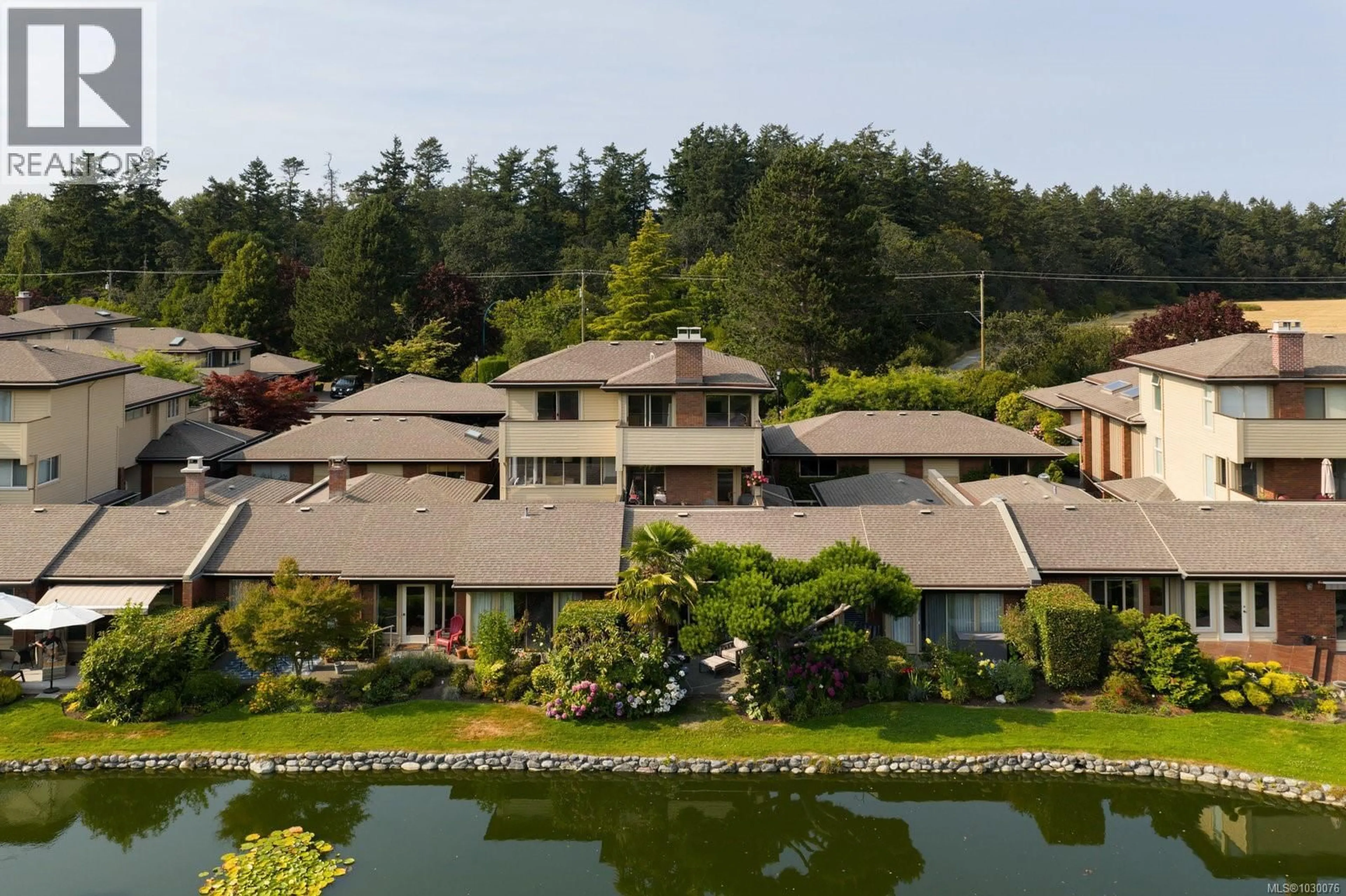 A pic from outside/outdoor area/front of a property/back of a property/a pic from drone, water/lake/river/ocean view for 124 - 2345 CEDAR HILL CROSS ROAD, Oak Bay British Columbia V8P5M8