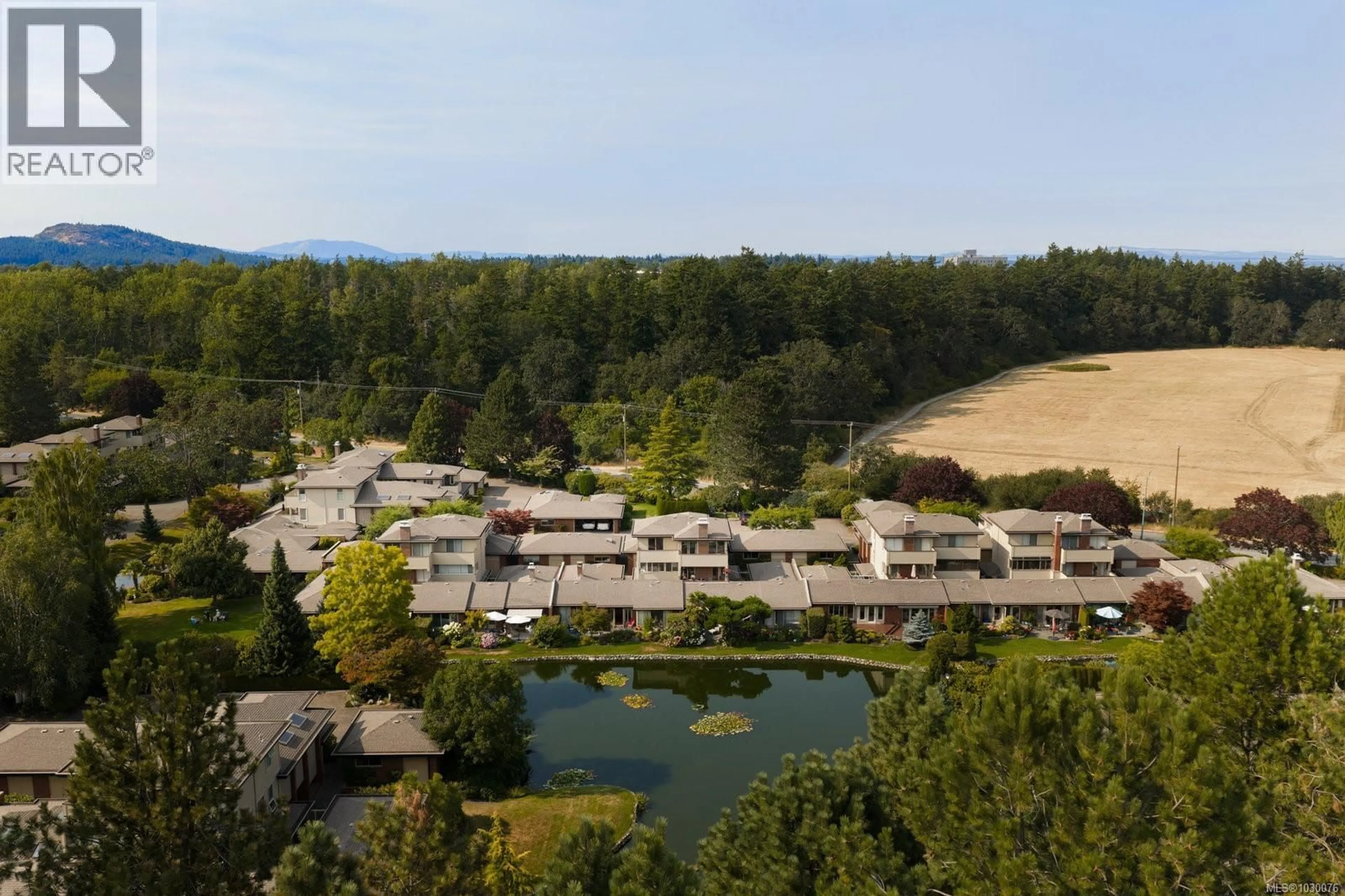 A pic from outside/outdoor area/front of a property/back of a property/a pic from drone, water/lake/river/ocean view for 124 - 2345 CEDAR HILL CROSS ROAD, Oak Bay British Columbia V8P5M8