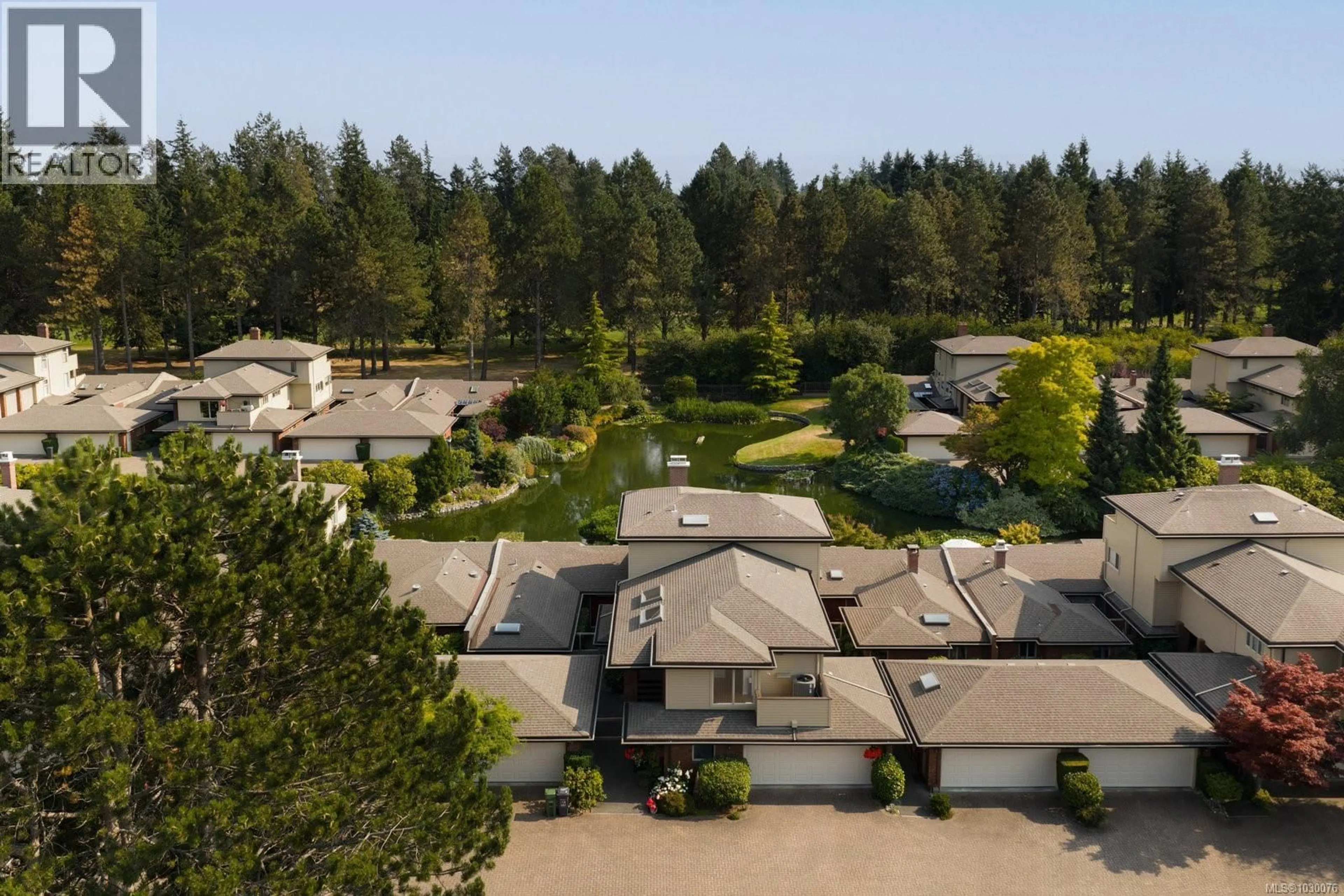A pic from outside/outdoor area/front of a property/back of a property/a pic from drone, forest/trees view for 124 - 2345 CEDAR HILL CROSS ROAD, Oak Bay British Columbia V8P5M8