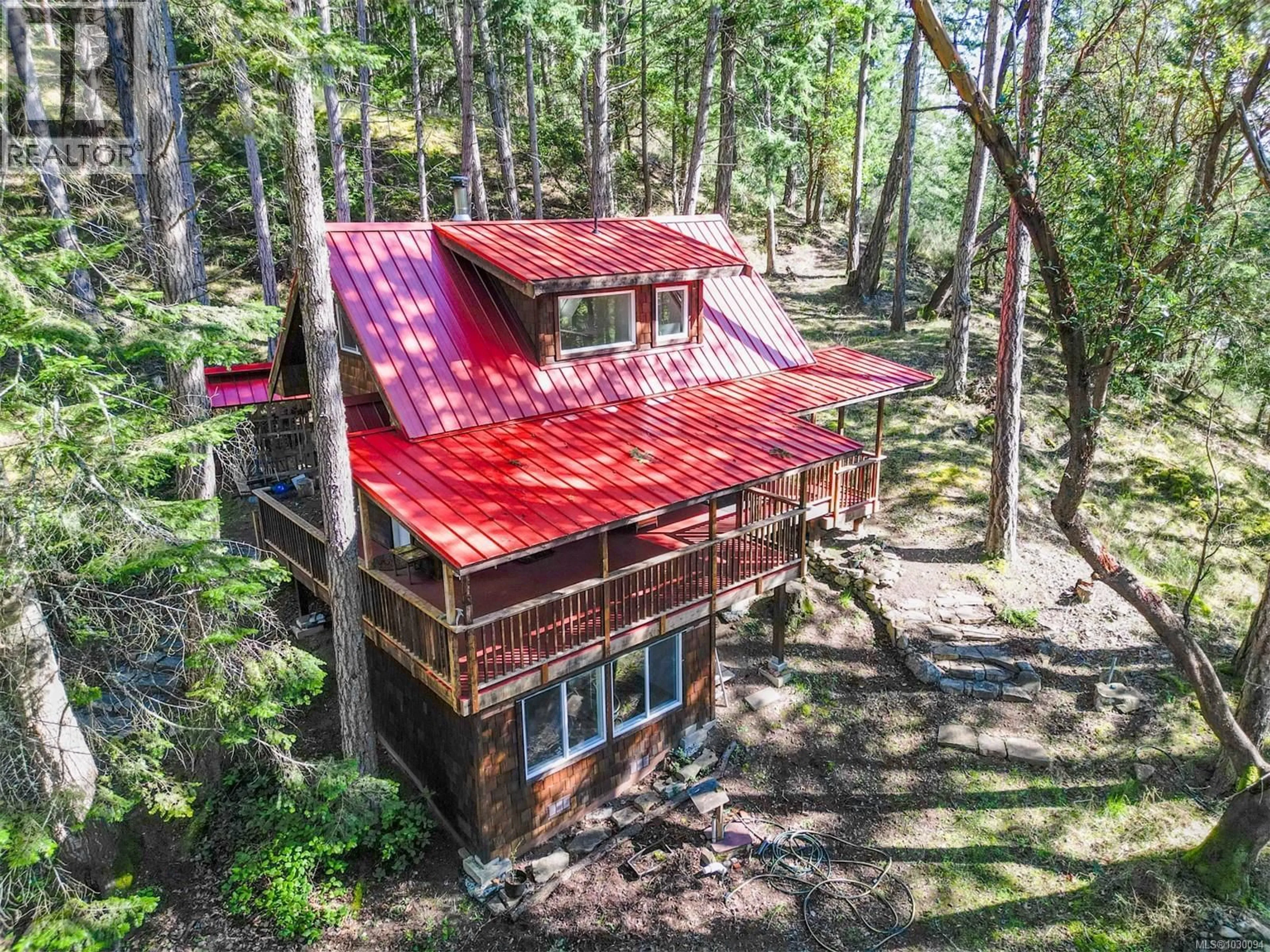 A pic from outside/outdoor area/front of a property/back of a property/a pic from drone, forest/trees view for 9868 CASTLE ROAD, Pender Island British Columbia V0N2M3