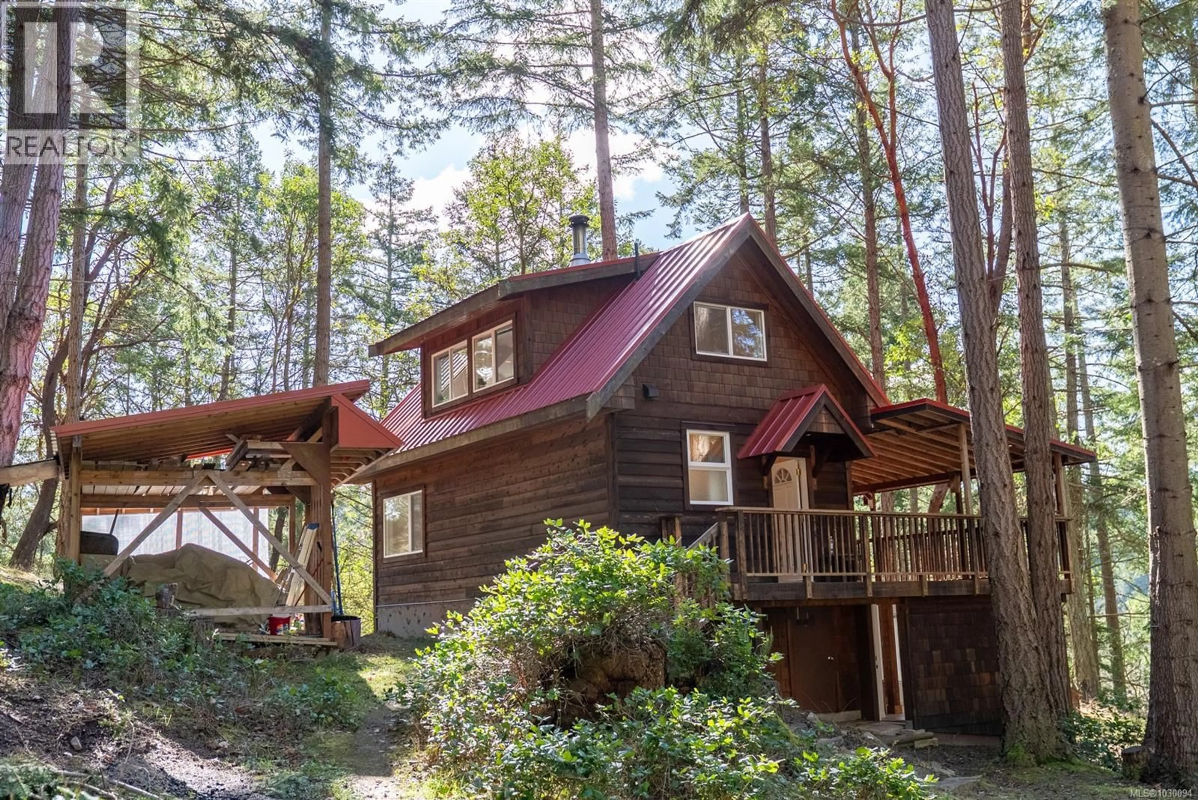 Home with vinyl exterior material, forest/trees view for 9868 CASTLE ROAD, Pender Island British Columbia V0N2M3