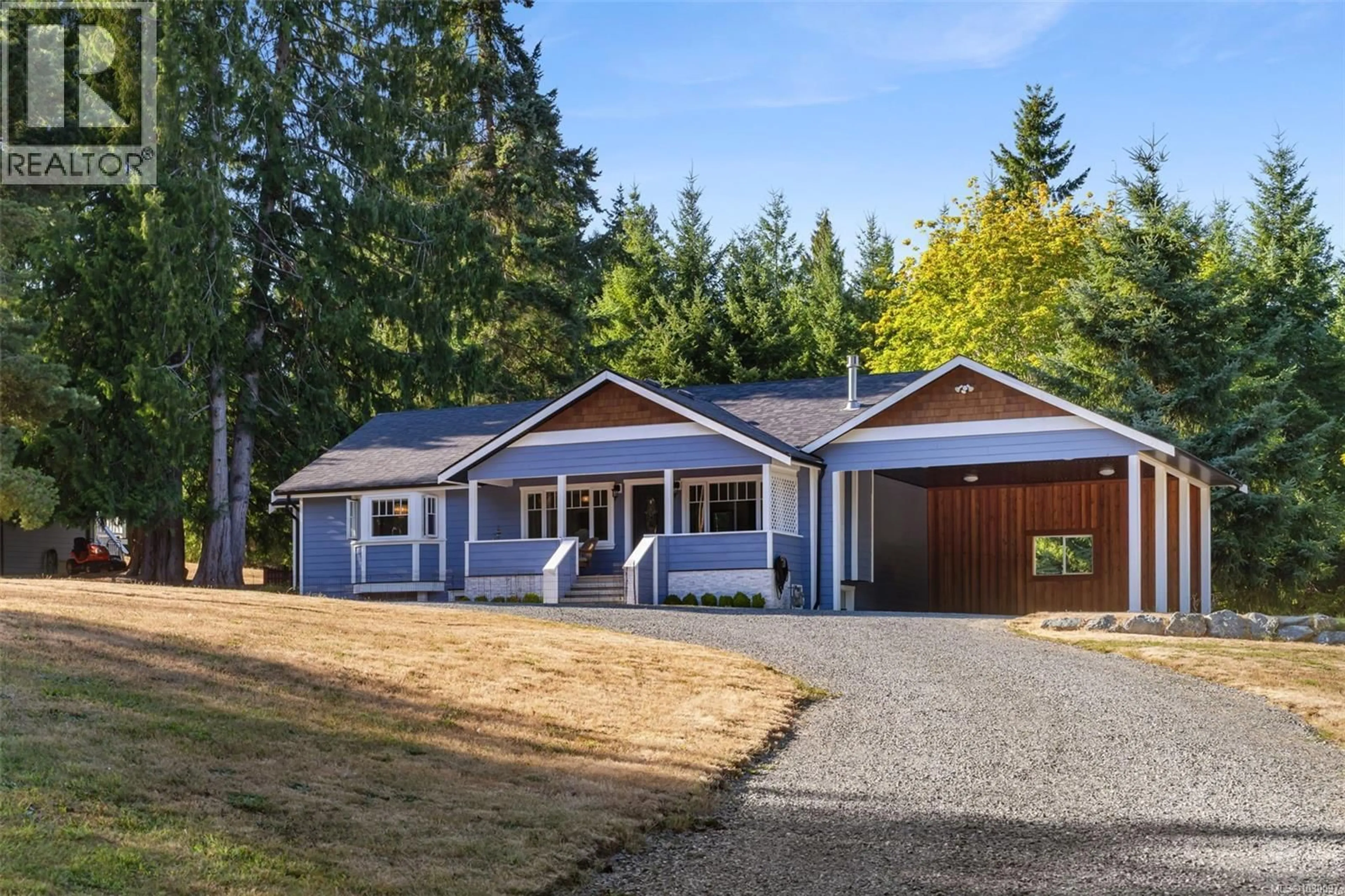 Home with vinyl exterior material, street for 1501 SHAWNIGAN MILL BAY ROAD, Shawnigan Lake British Columbia V0R2W0