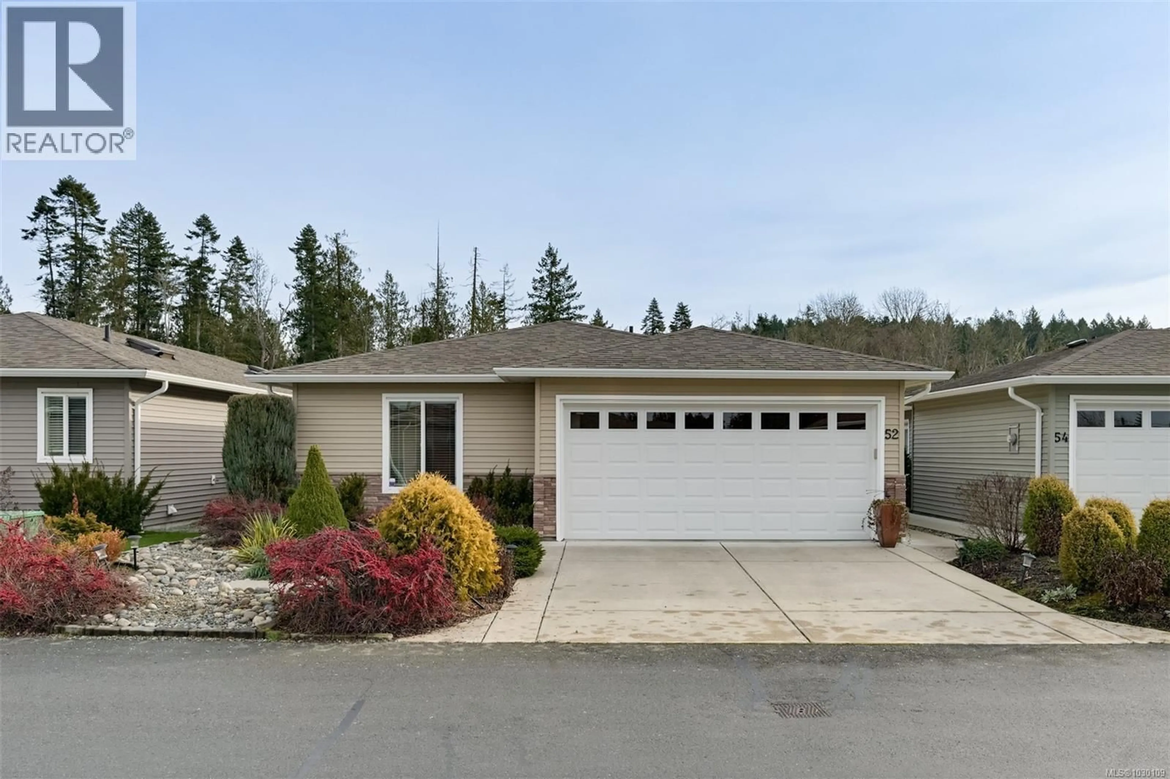 Home with vinyl exterior material, street for 52 - 7586 TETAYUT ROAD, Central Saanich British Columbia V8M0B4