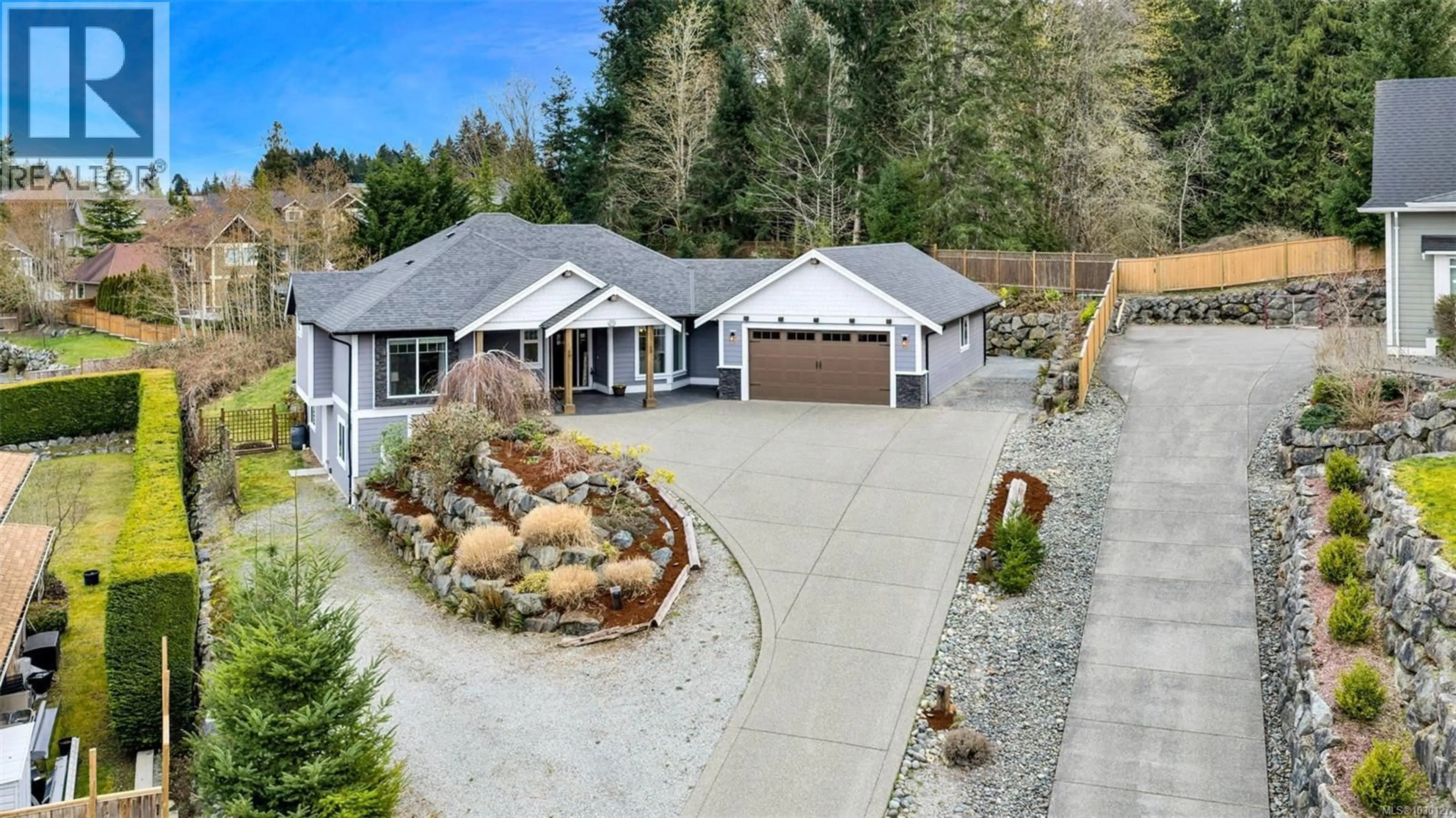 A pic from outside/outdoor area/front of a property/back of a property/a pic from drone, street for 2548 STUBBS ROAD, Mill Bay British Columbia V8H1H6