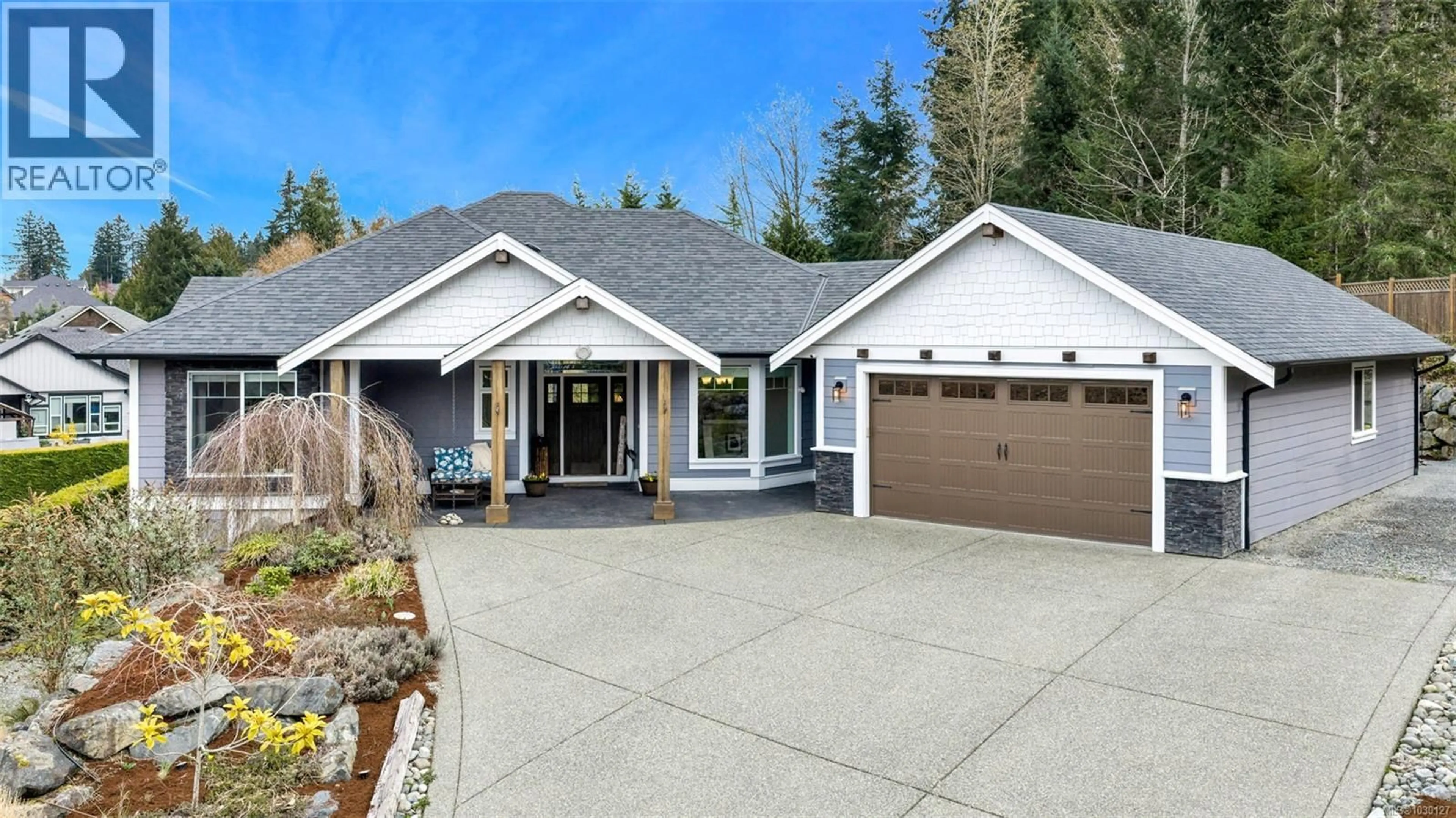 Home with vinyl exterior material, street for 2548 STUBBS ROAD, Mill Bay British Columbia V8H1H6