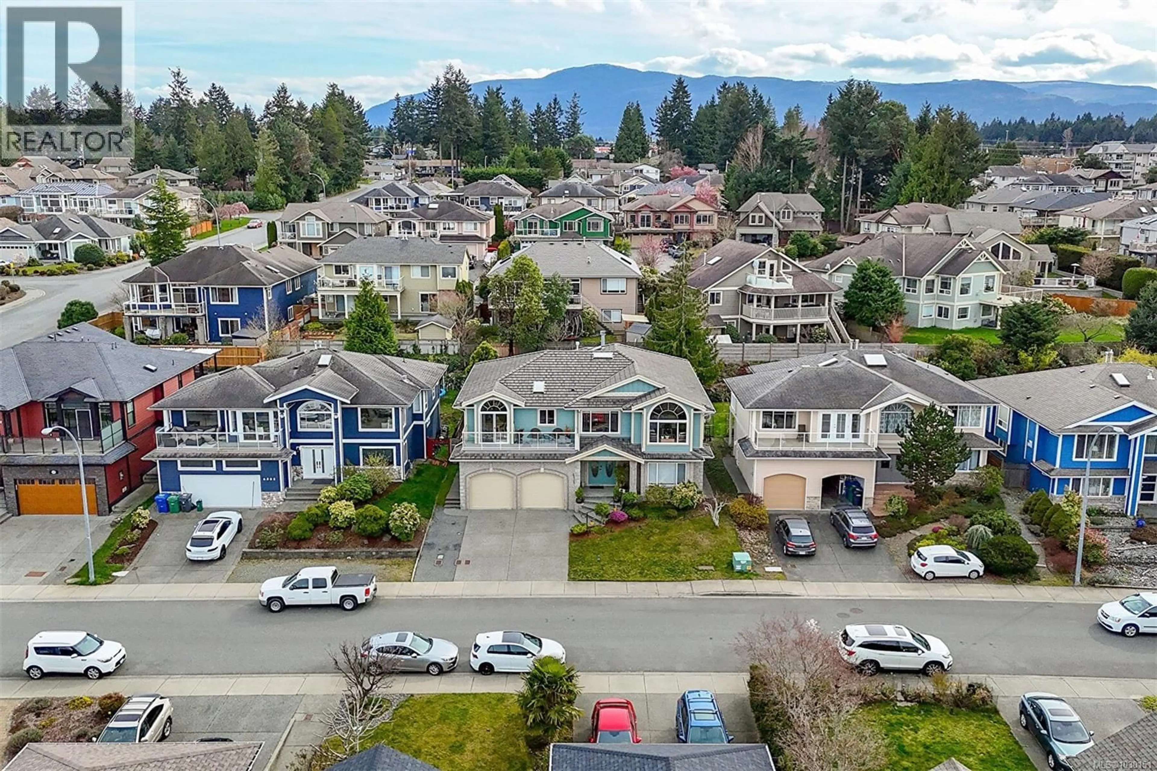 A pic from outside/outdoor area/front of a property/back of a property/a pic from drone, mountain view for 6509 KESTREL CRESCENT, Nanaimo British Columbia V9R6V9