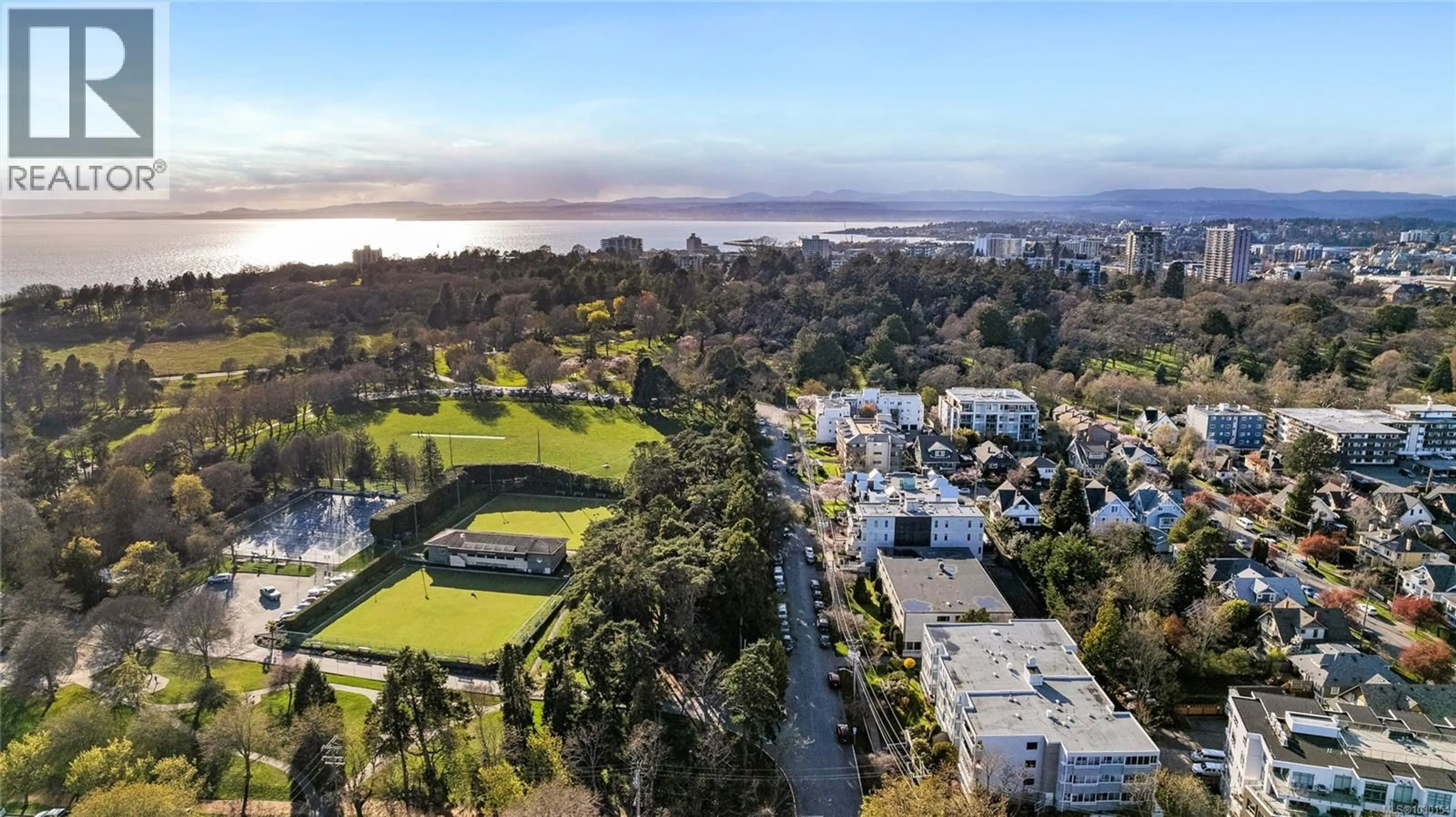 A pic from outside/outdoor area/front of a property/back of a property/a pic from drone, water/lake/river/ocean view for 207 - 1050 PARK BOULEVARD, Victoria British Columbia V8V2T4