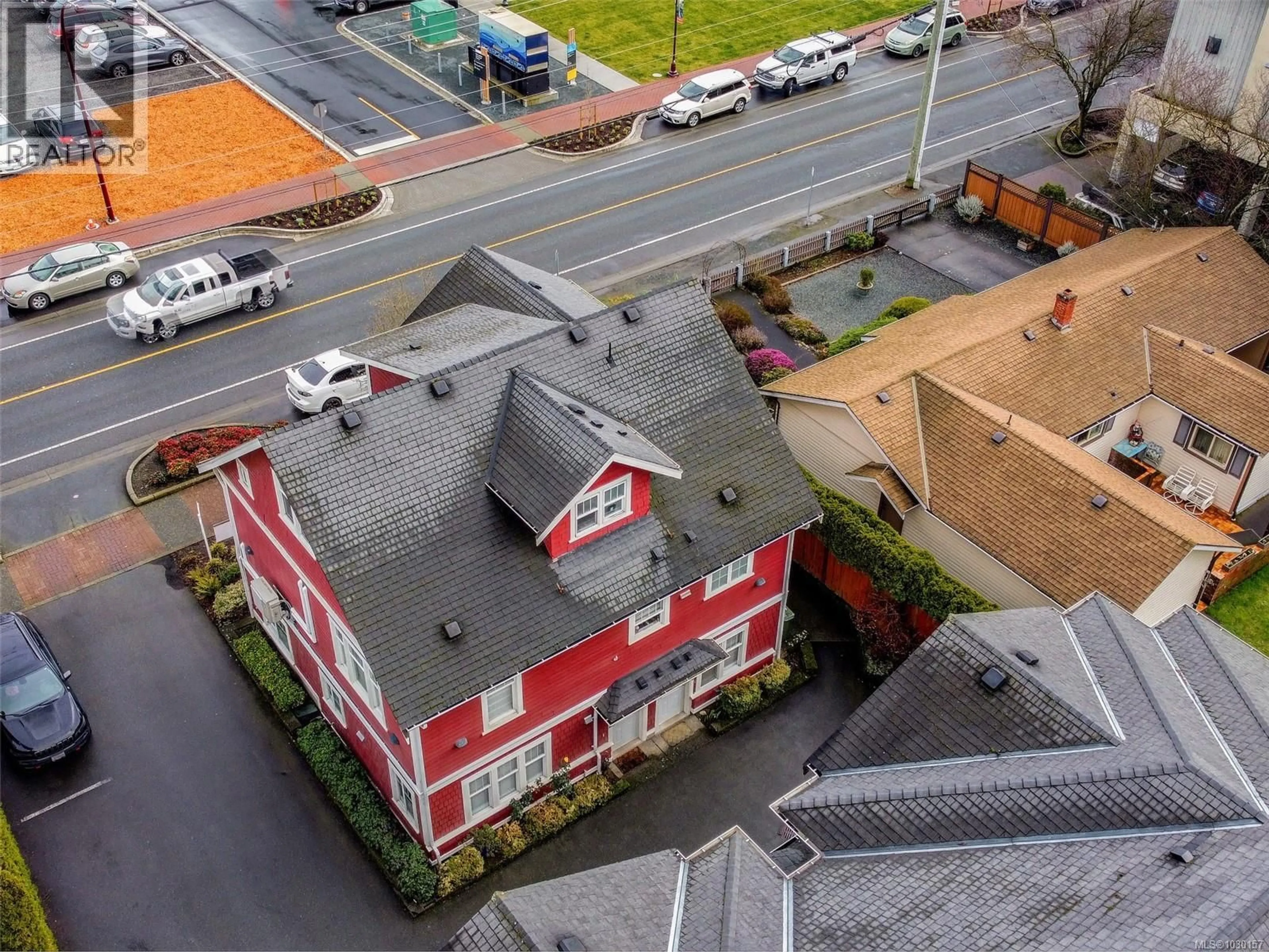 A pic from outside/outdoor area/front of a property/back of a property/a pic from drone, building for 104 - 2766 PEATT ROAD, Langford British Columbia V9B3V3
