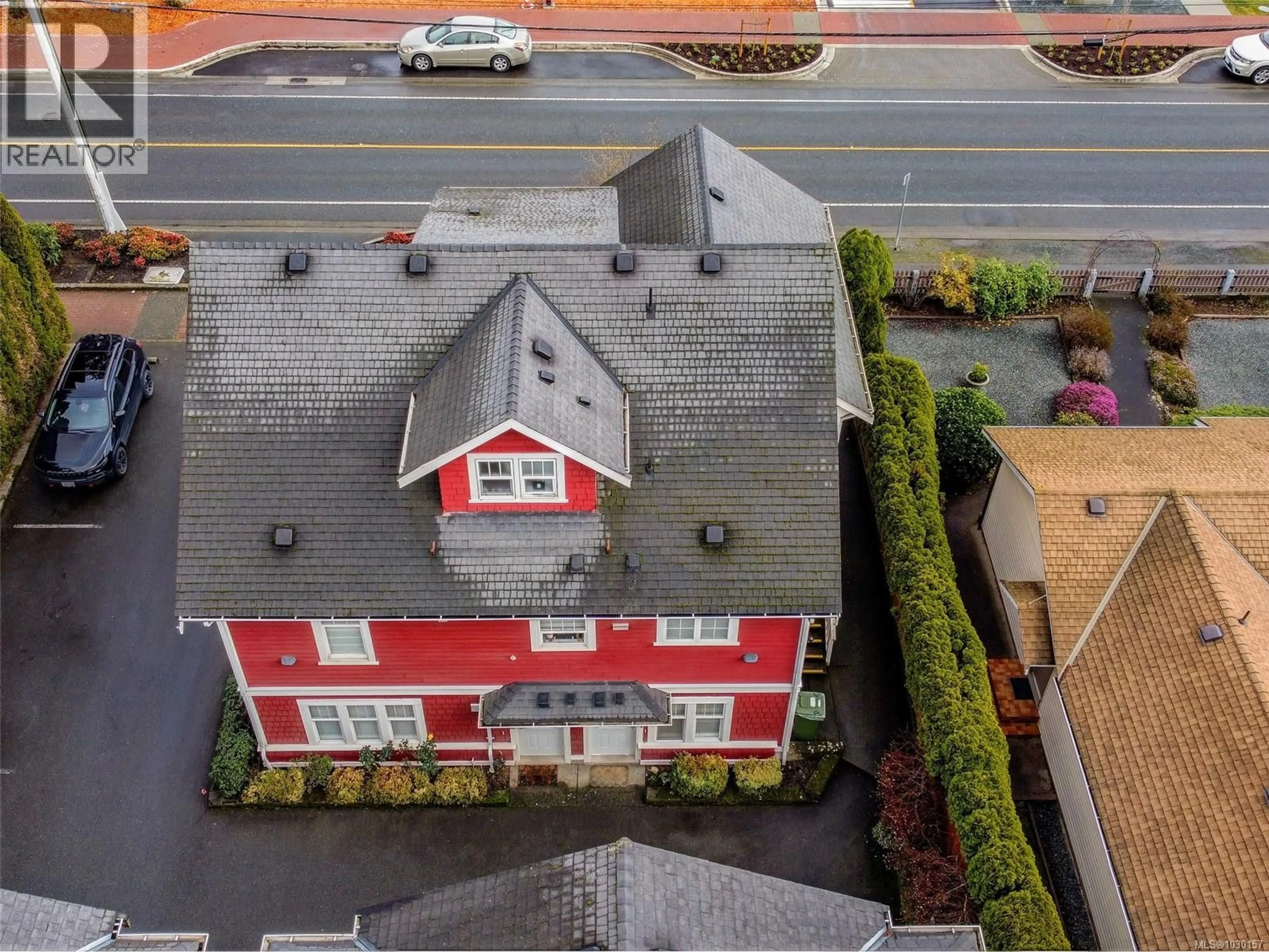 A pic from outside/outdoor area/front of a property/back of a property/a pic from drone, building for 104 - 2766 PEATT ROAD, Langford British Columbia V9B3V3