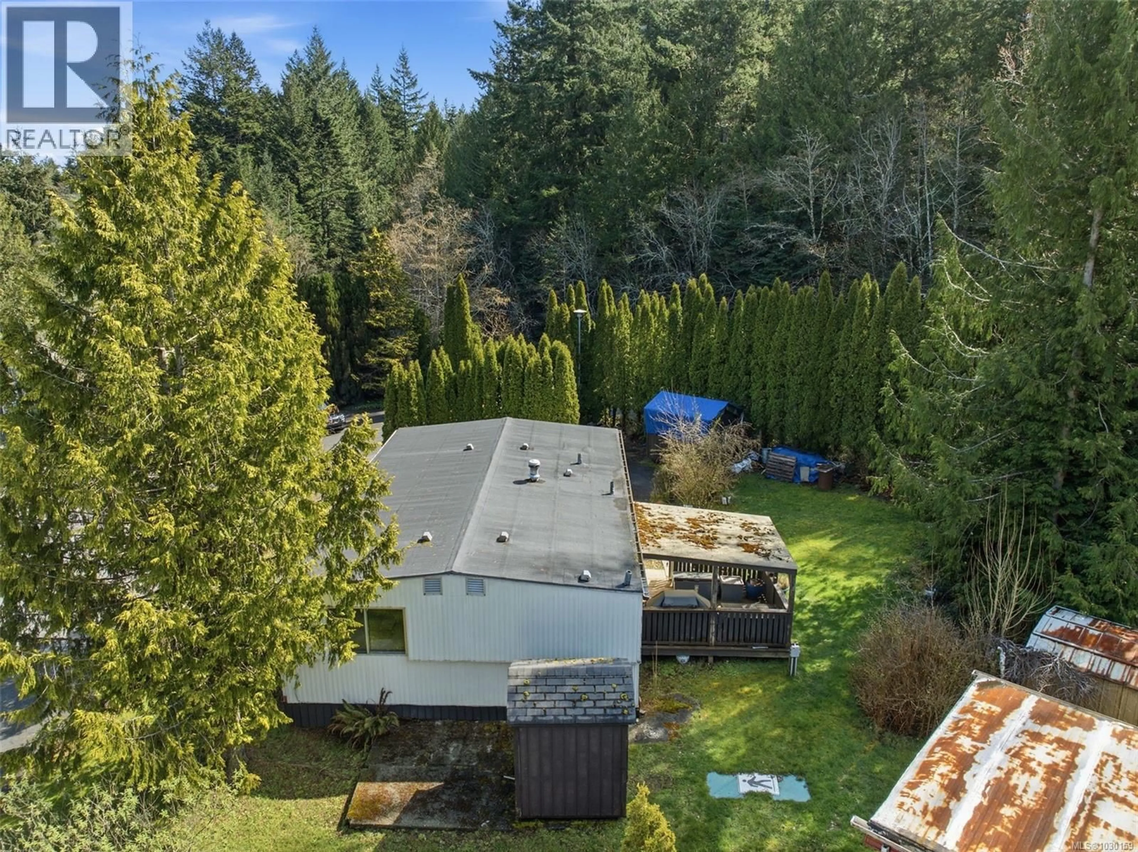 A pic from outside/outdoor area/front of a property/back of a property/a pic from drone, forest/trees view for 11 - 2615 OTTER POINT ROAD, Sooke British Columbia V0S1N0