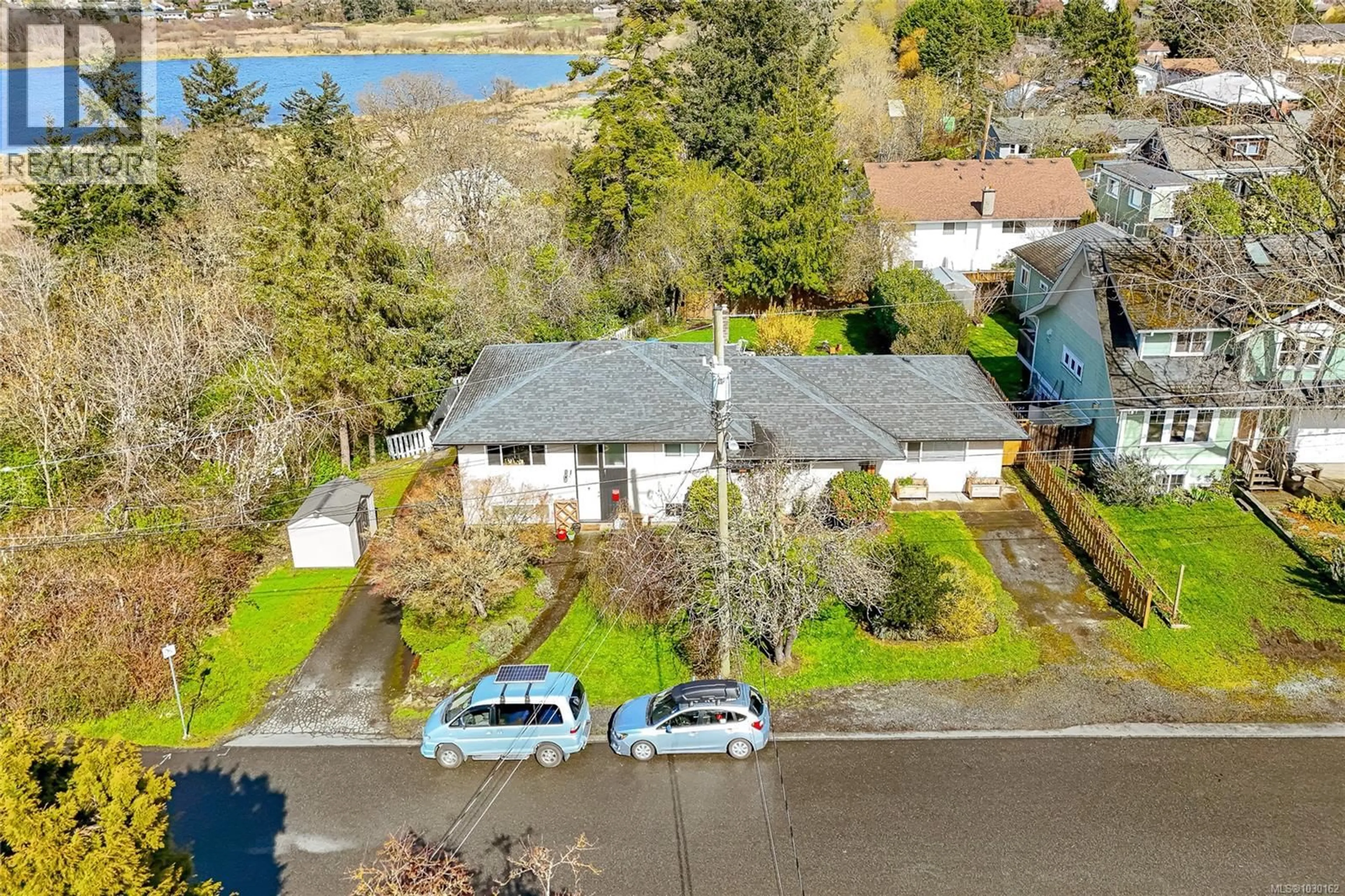 A pic from outside/outdoor area/front of a property/back of a property/a pic from drone, water/lake/river/ocean view for 820-822 LESLIE DRIVE, Saanich British Columbia V8X2Y4
