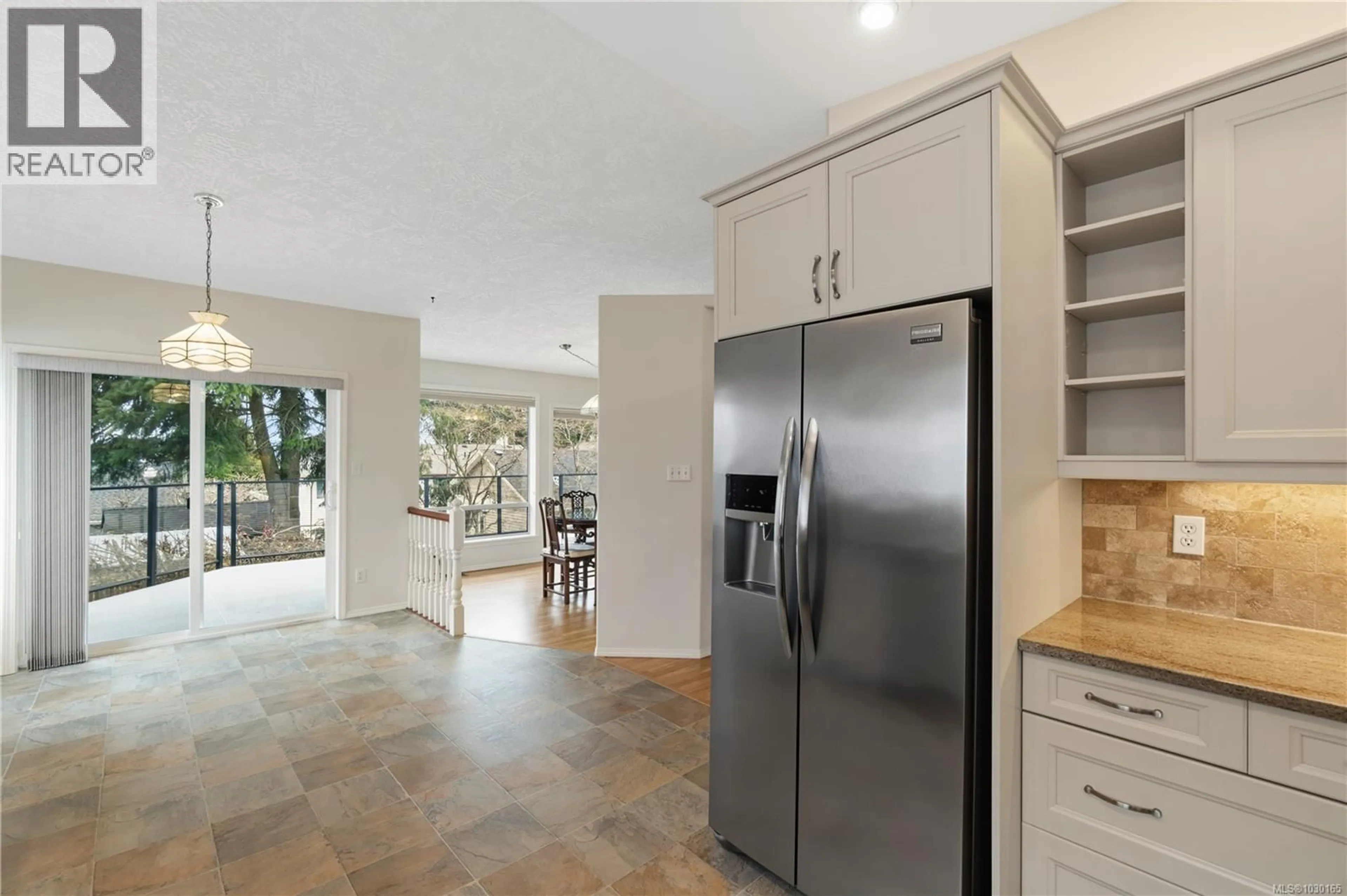 Open concept kitchen, ceramic/tile floor for 5735 MALIBU TERRACE, Nanaimo British Columbia V9T5Y8