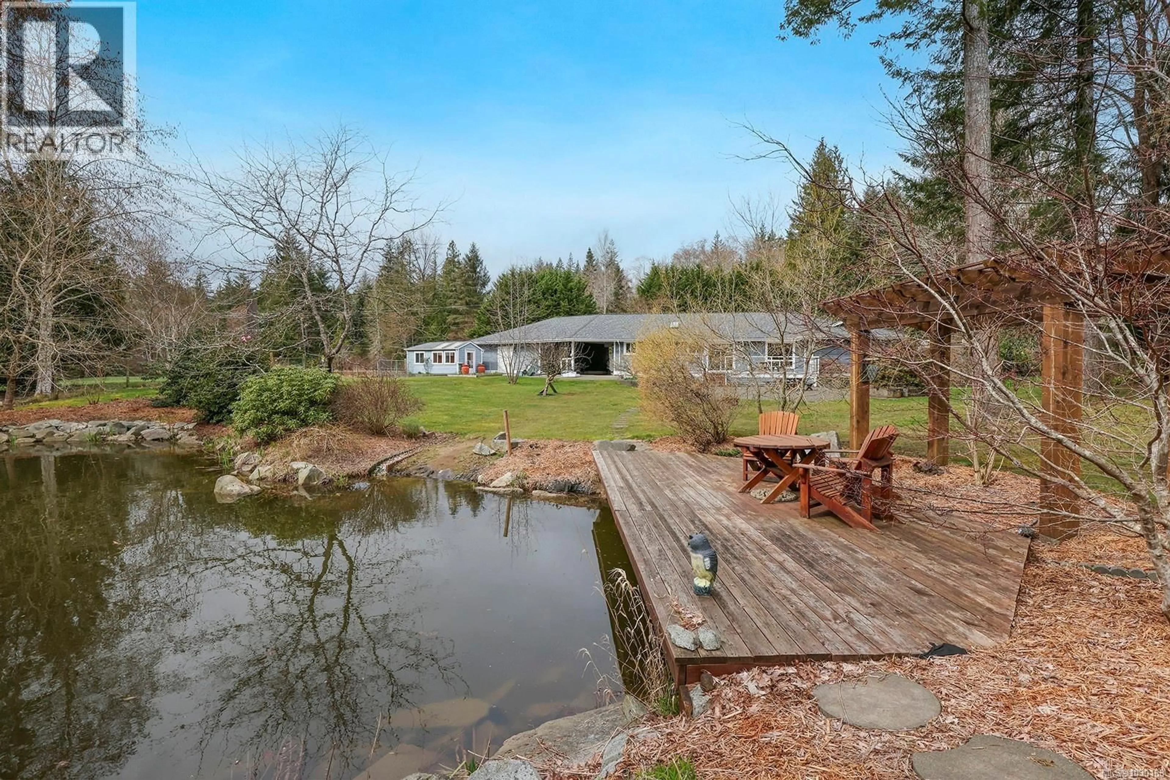 A pic from outside/outdoor area/front of a property/back of a property/a pic from drone, water/lake/river/ocean view for 2495 HUBAND ROAD, Courtenay British Columbia V9J1L6