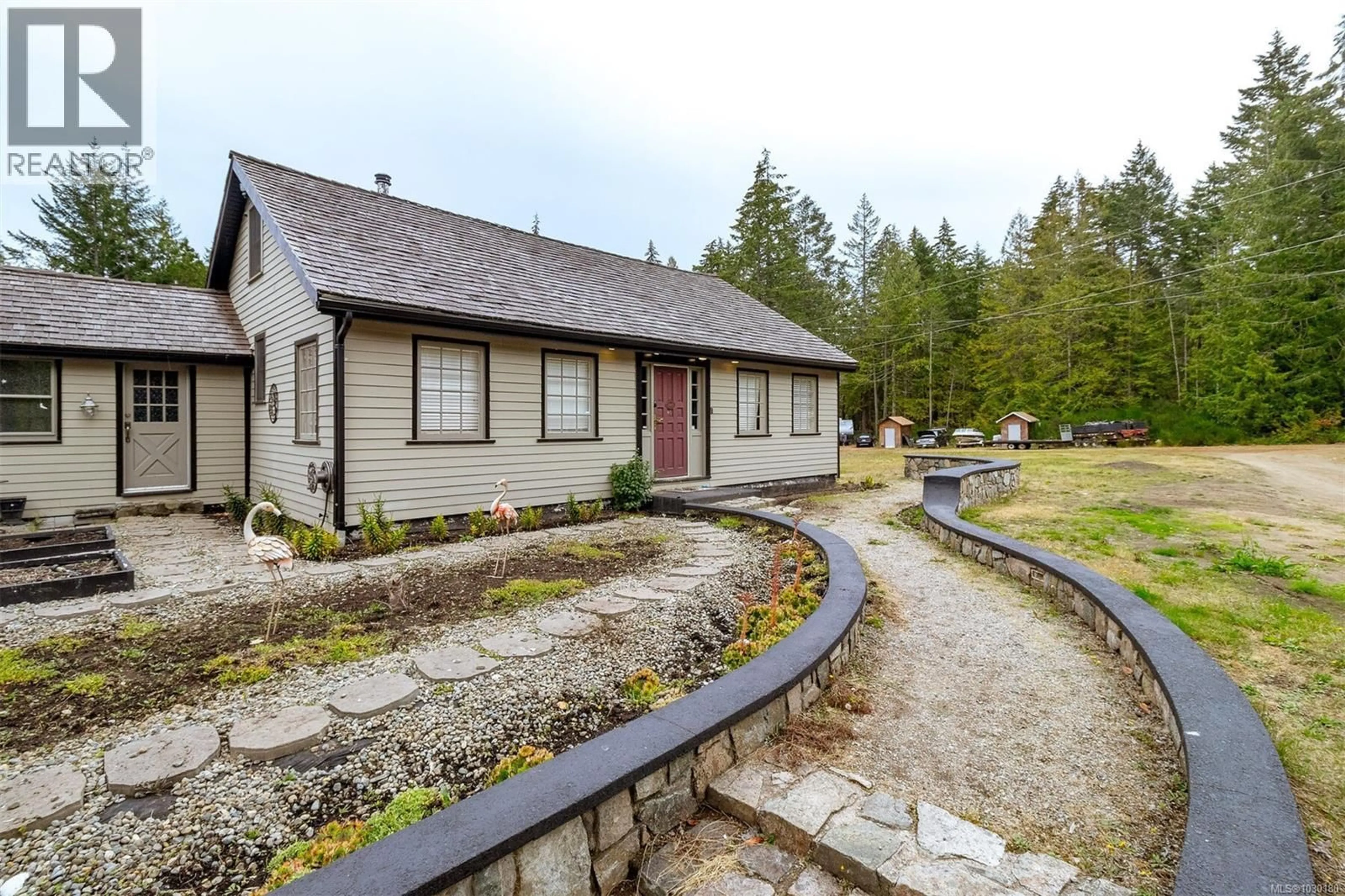 A pic from outside/outdoor area/front of a property/back of a property/a pic from drone, street for 285 POLEGATE ROAD, Qualicum Beach British Columbia V9K1Y9