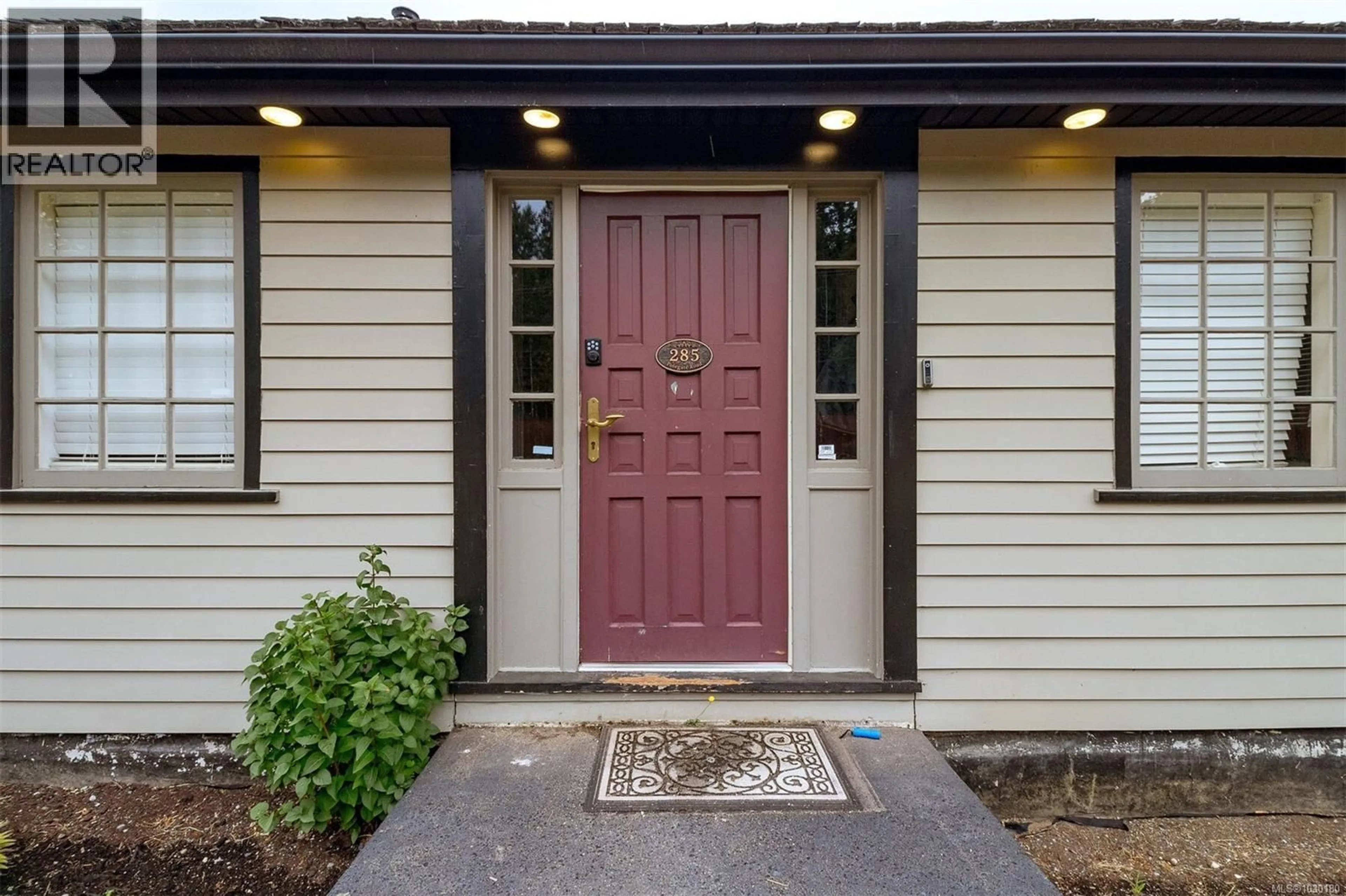 Home with vinyl exterior material, street for 285 POLEGATE ROAD, Qualicum Beach British Columbia V9K1Y9