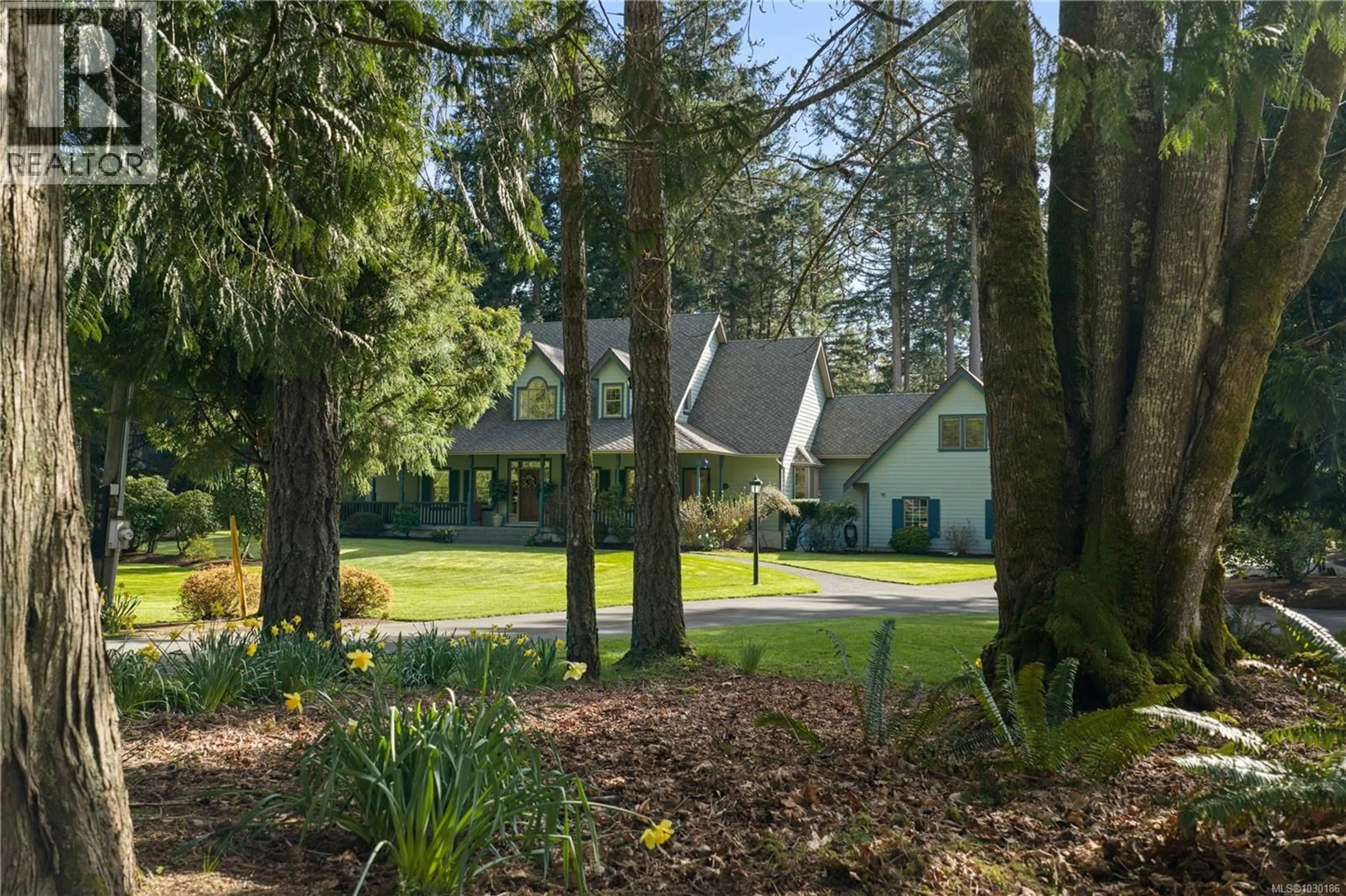 A pic from outside/outdoor area/front of a property/back of a property/a pic from drone, forest/trees view for 1228 GARDEN GATE DRIVE, Central Saanich British Columbia V8M2H6