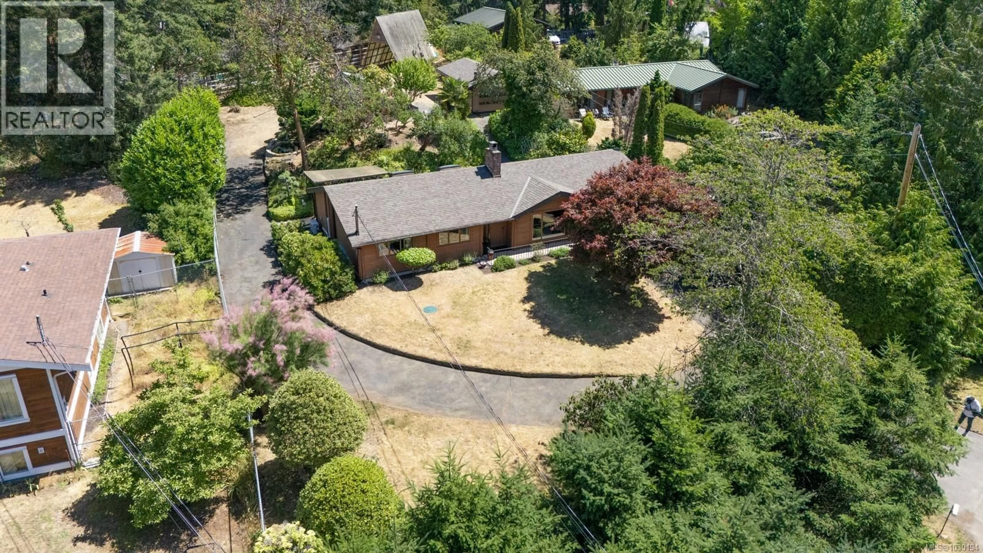 A pic from outside/outdoor area/front of a property/back of a property/a pic from drone, street for 1600 SEACREST ROAD, Nanoose Bay British Columbia V9P9B5