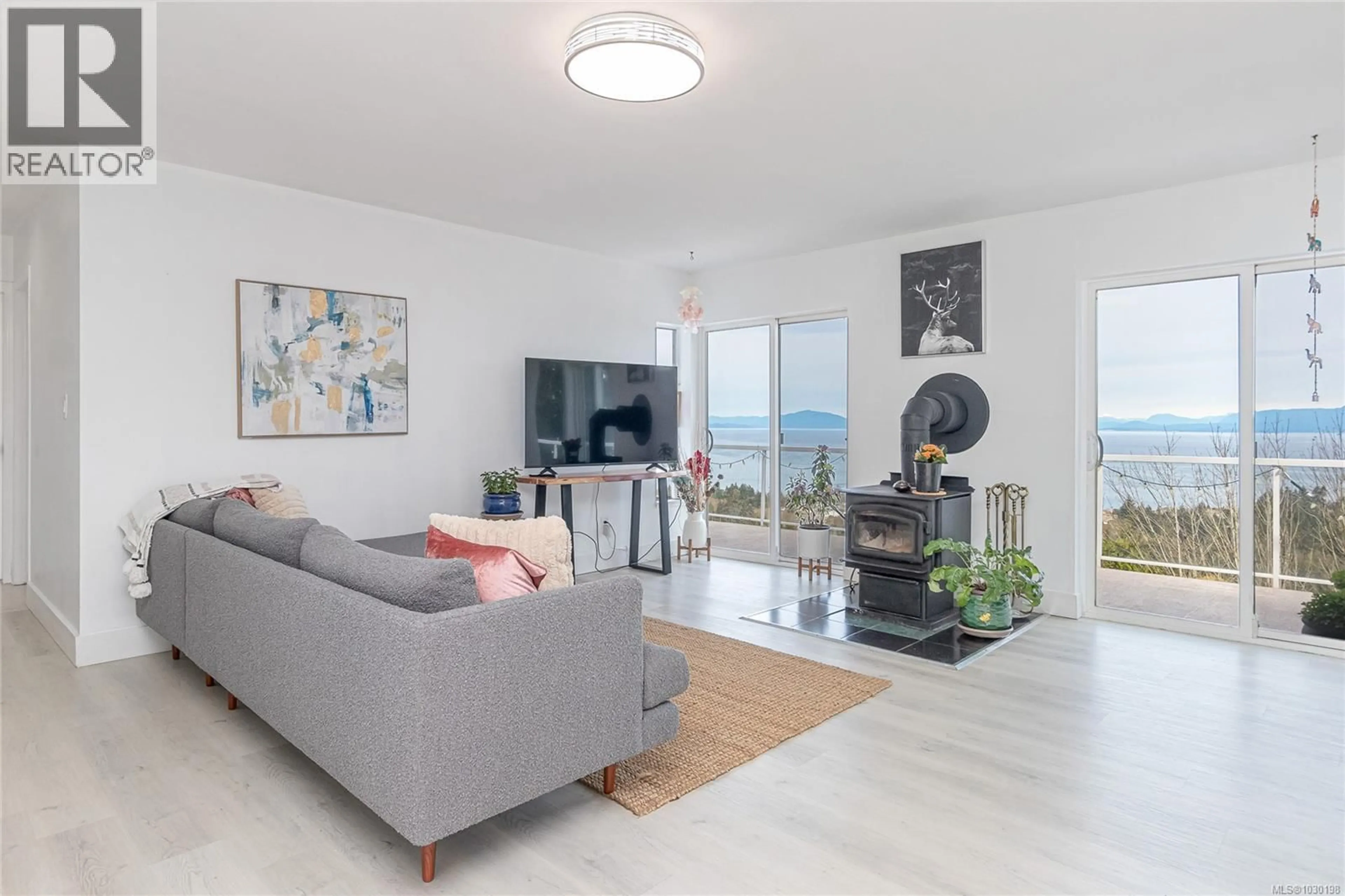 Living room with furniture, unknown for 4975 LAGUNA WAY, Nanaimo British Columbia V9T5L6