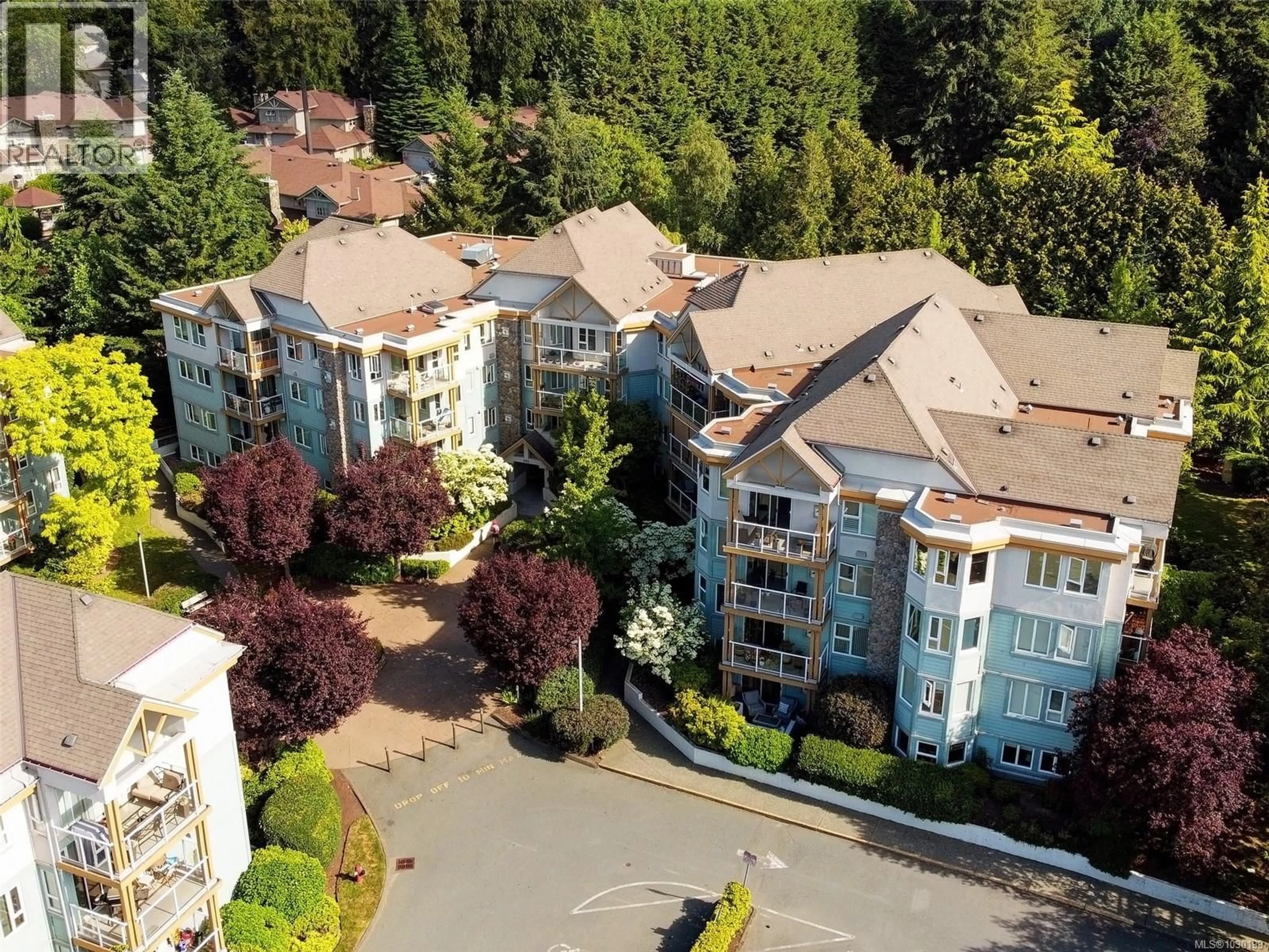 A pic from outside/outdoor area/front of a property/back of a property/a pic from drone, unknown for 203 - 490 MARSETT PLACE, Saanich British Columbia V8Z7J1