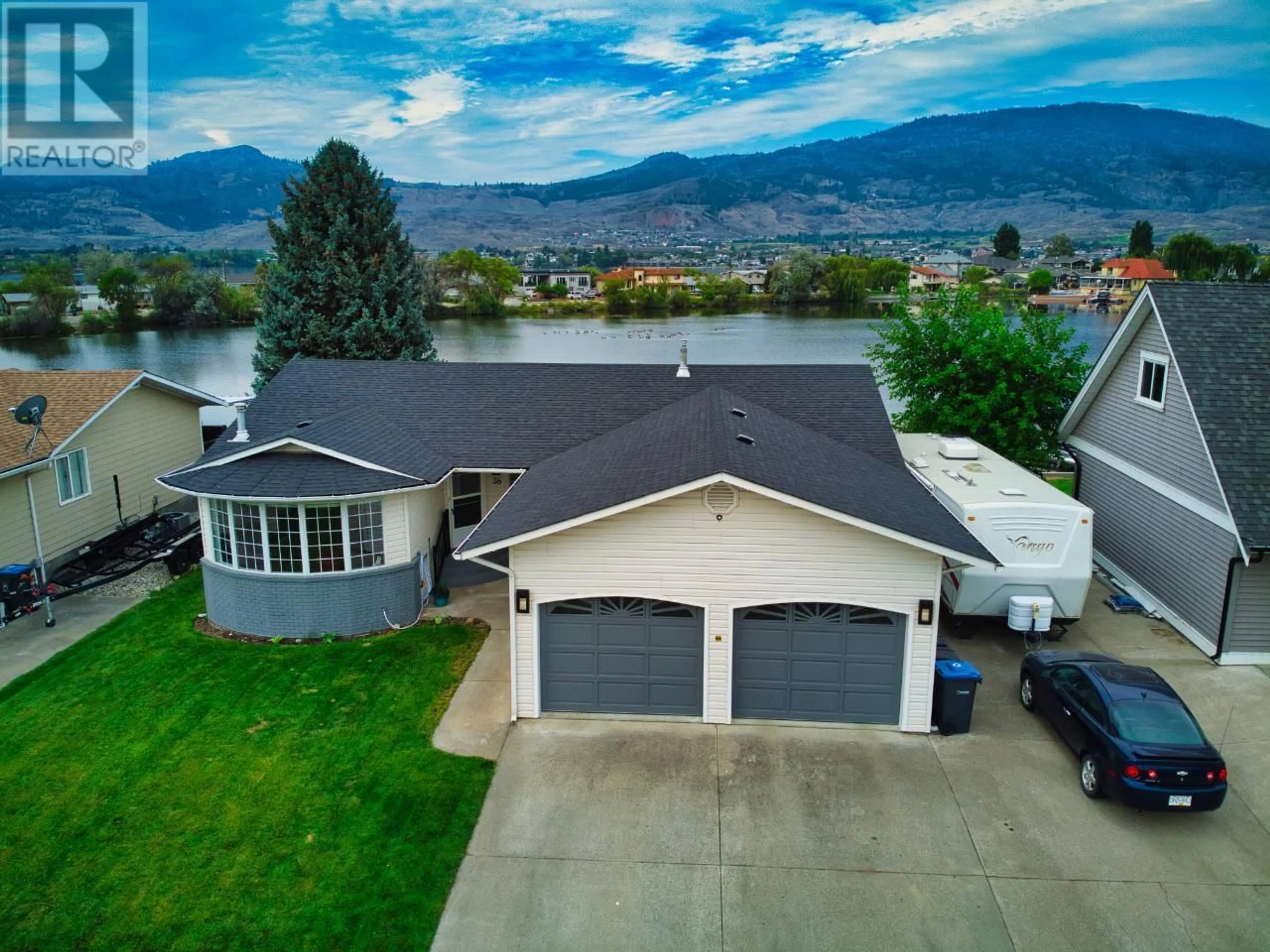 Frontside or backside of a home for 38 BAYVIEW Crescent, Osoyoos British Columbia V0H1V6