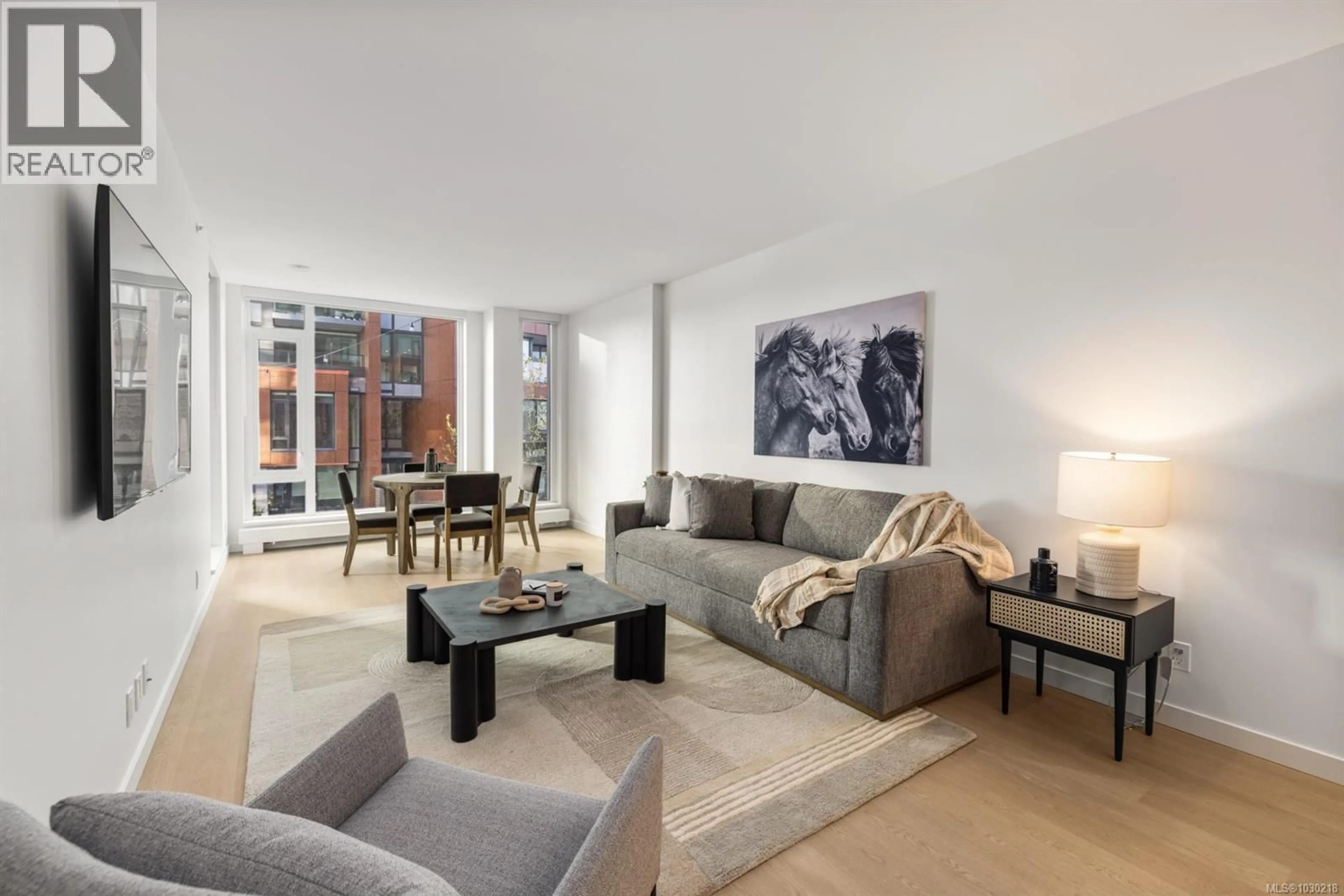 Living room with furniture, unknown for 204 - 369 TYEE ROAD, Victoria British Columbia V9A0B6