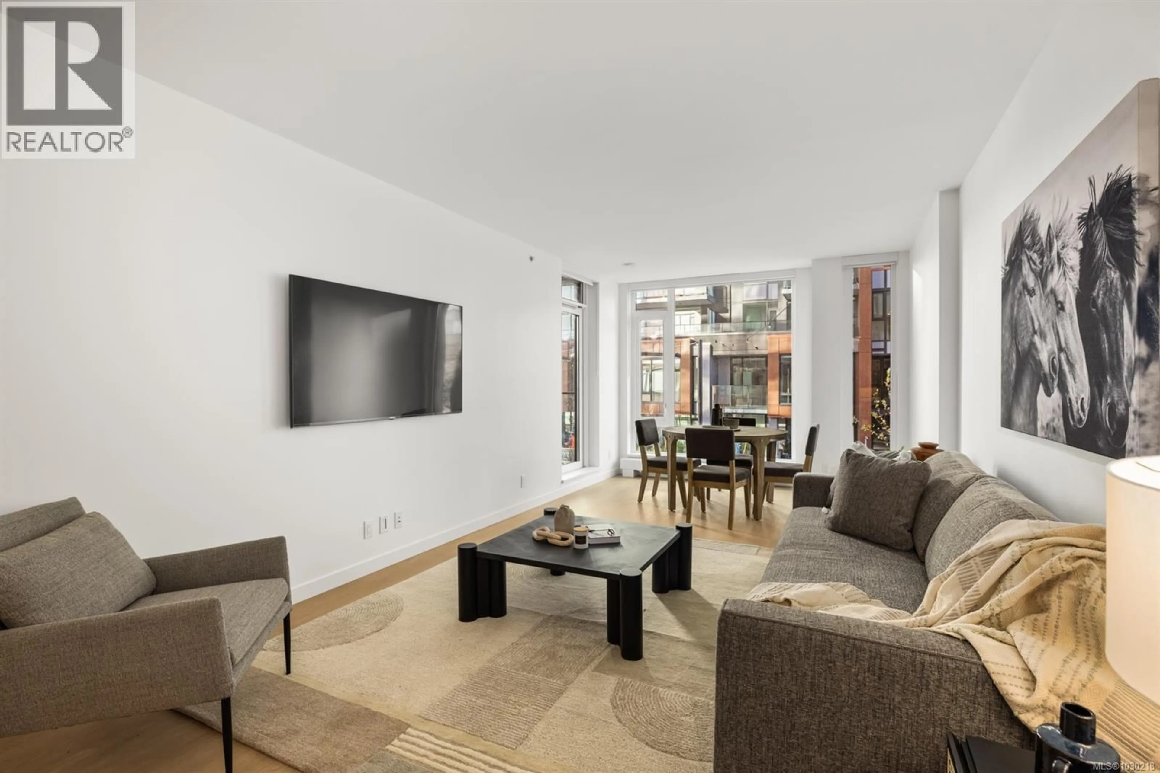 Living room with furniture, unknown for 204 - 369 TYEE ROAD, Victoria British Columbia V9A0B6