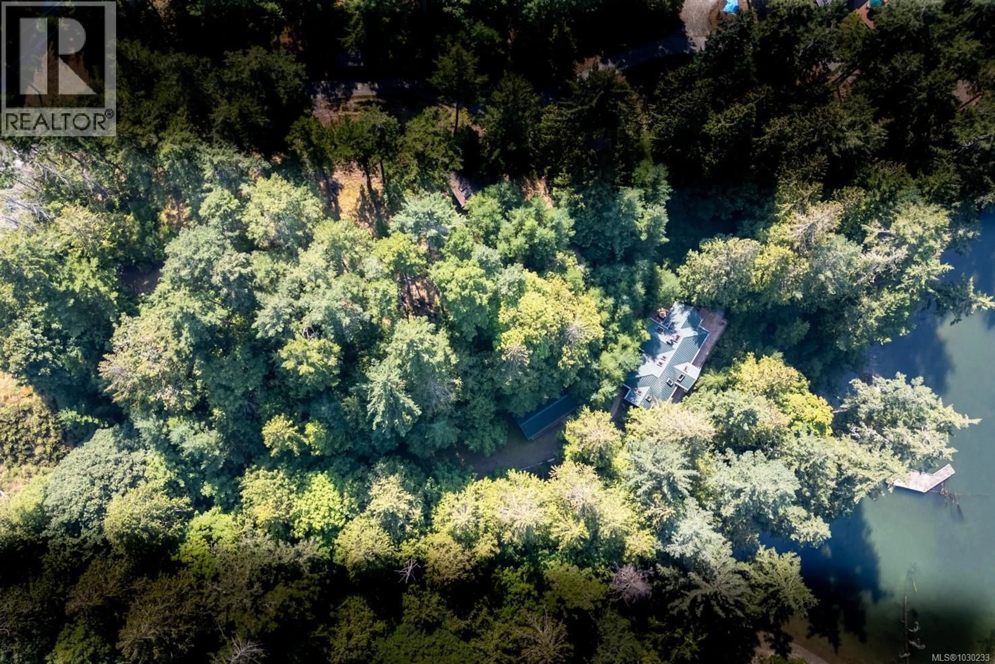 A pic from outside/outdoor area/front of a property/back of a property/a pic from drone, forest/trees view for 8807 AINSLIE POINT ROAD, Pender Island British Columbia V0N2M3