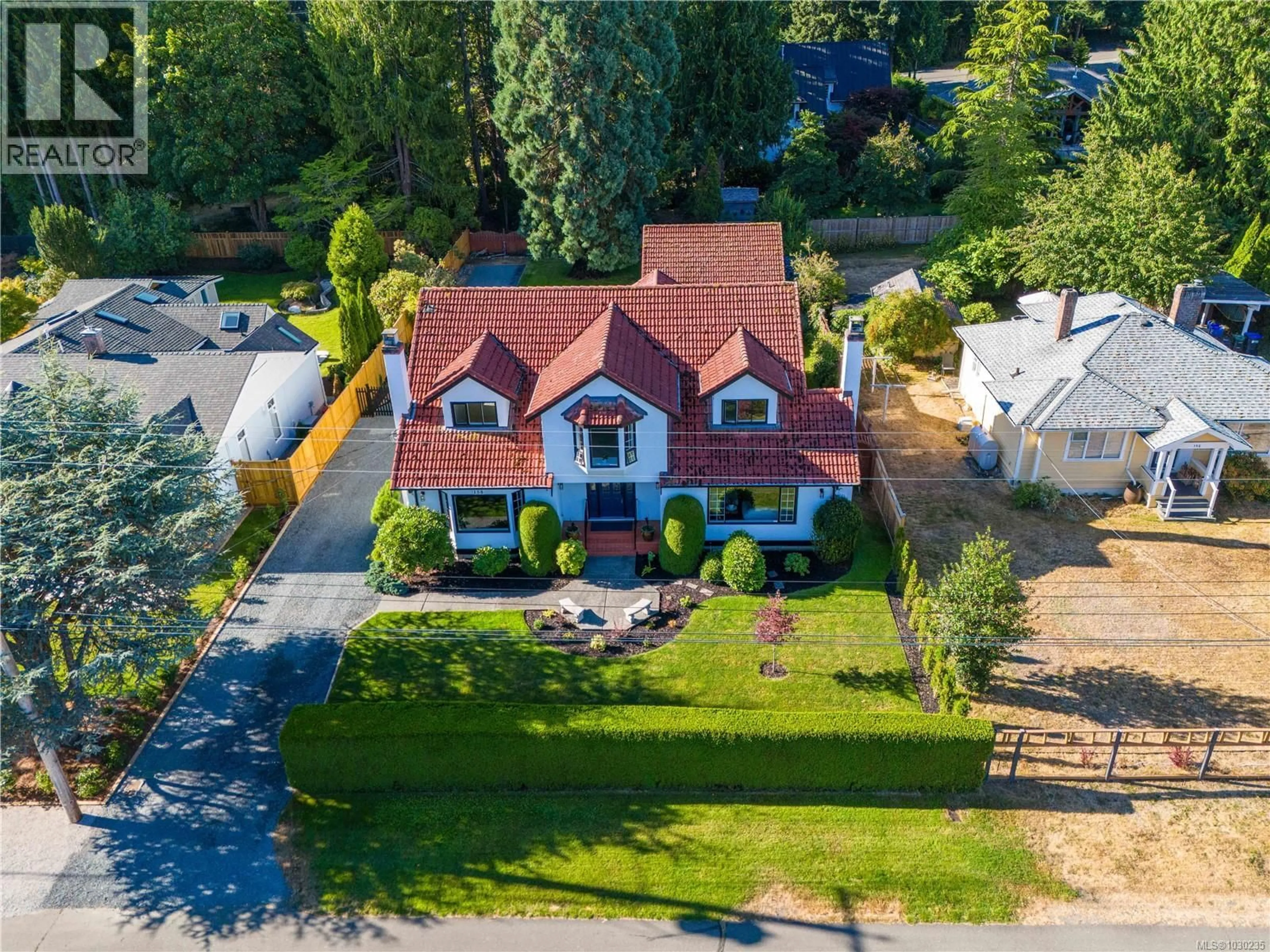 A pic from outside/outdoor area/front of a property/back of a property/a pic from drone, street for 158 CRESCENT ROAD EAST, Qualicum Beach British Columbia V9K1L6