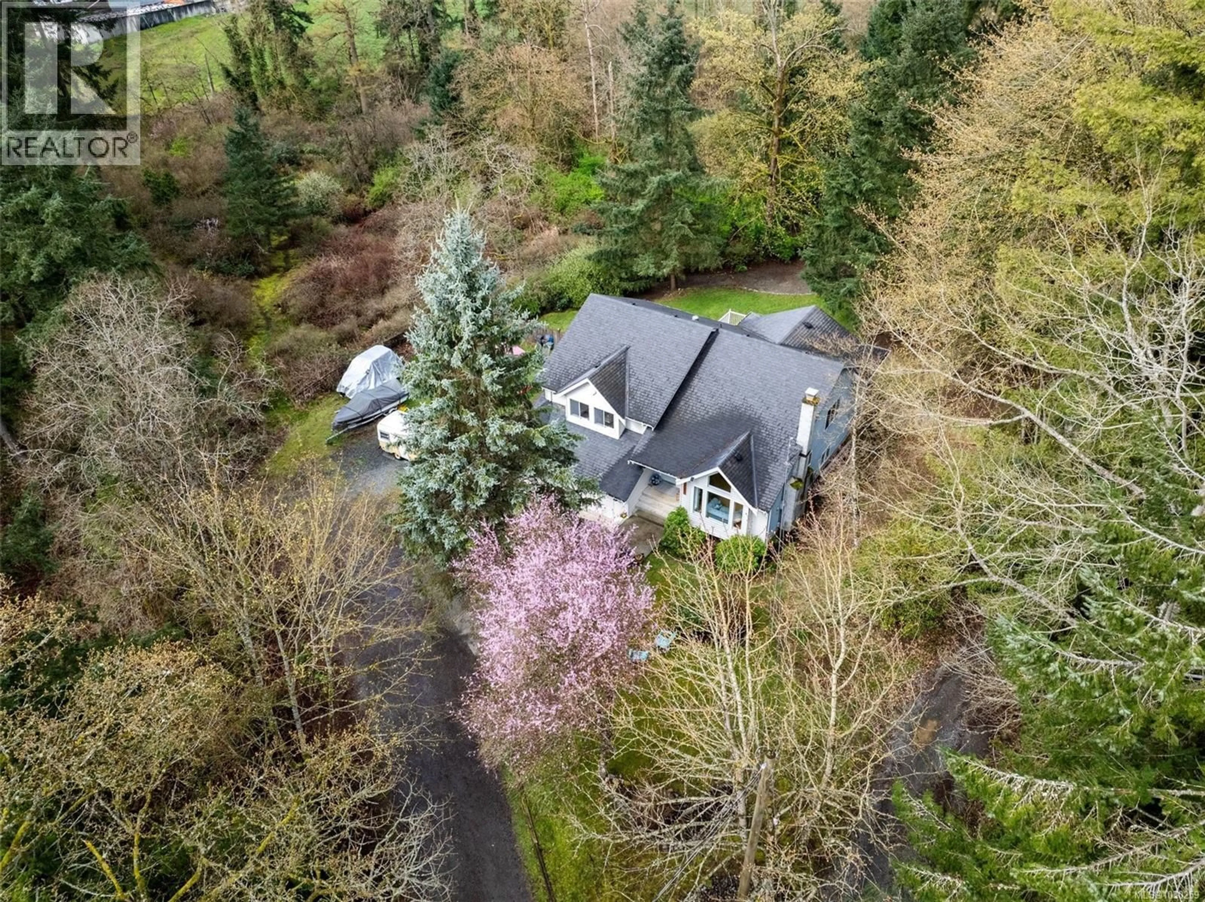 A pic from outside/outdoor area/front of a property/back of a property/a pic from drone, forest/trees view for 2087 INDIAN CRESCENT, Duncan British Columbia V9L5L9