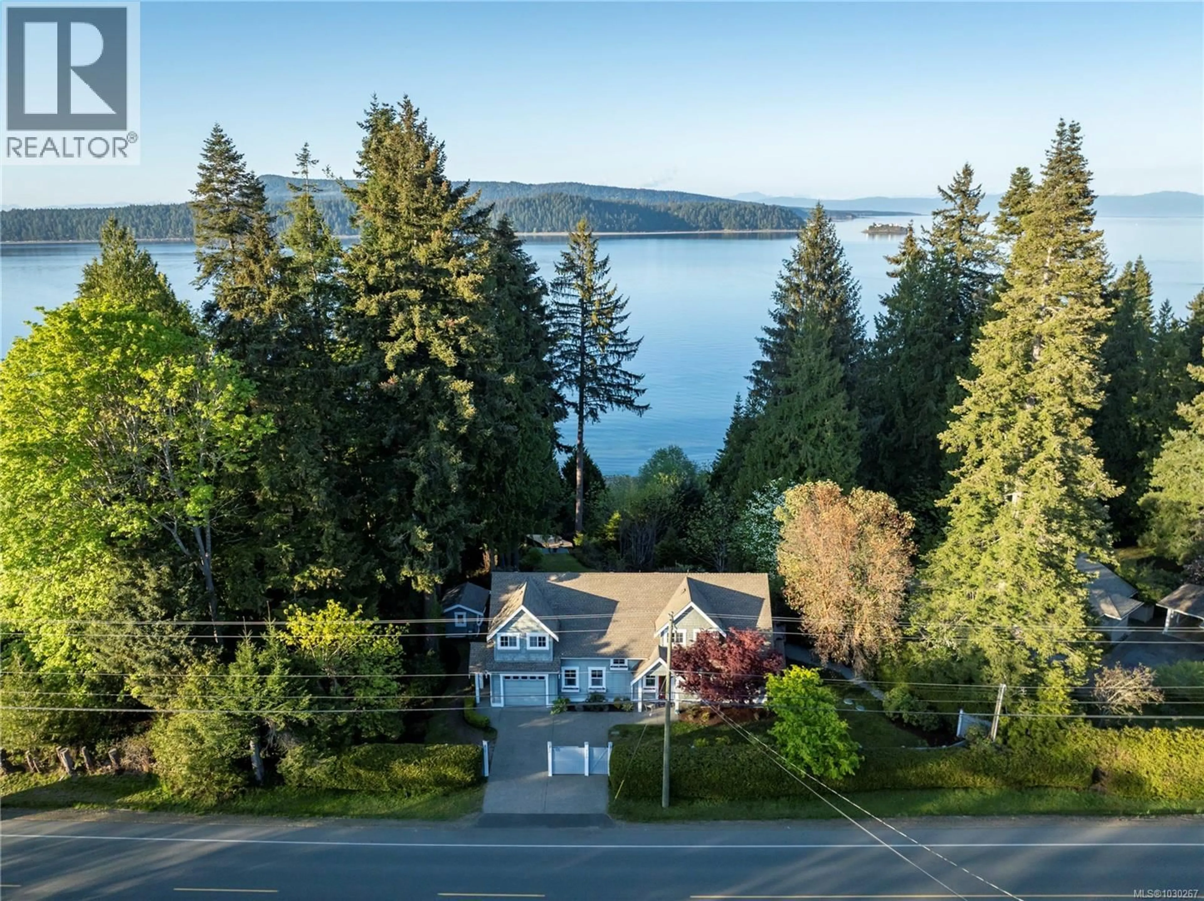 A pic from outside/outdoor area/front of a property/back of a property/a pic from drone, water/lake/river/ocean view for 5175 GAINSBERG ROAD, Bowser British Columbia V0R1G0