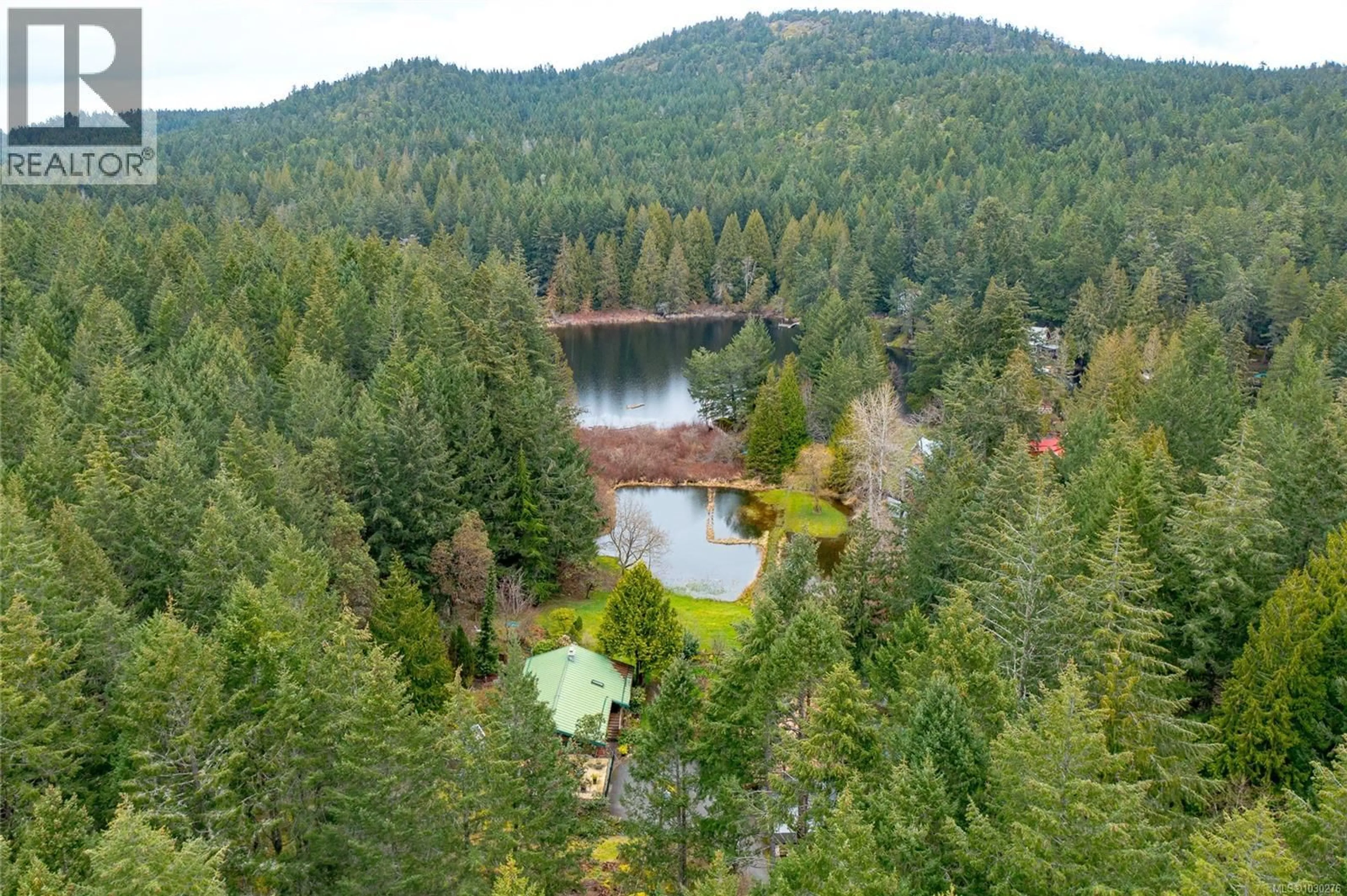 A pic from outside/outdoor area/front of a property/back of a property/a pic from drone, water/lake/river/ocean view for 5230 MUNN ROAD, Highlands British Columbia V9E1G8