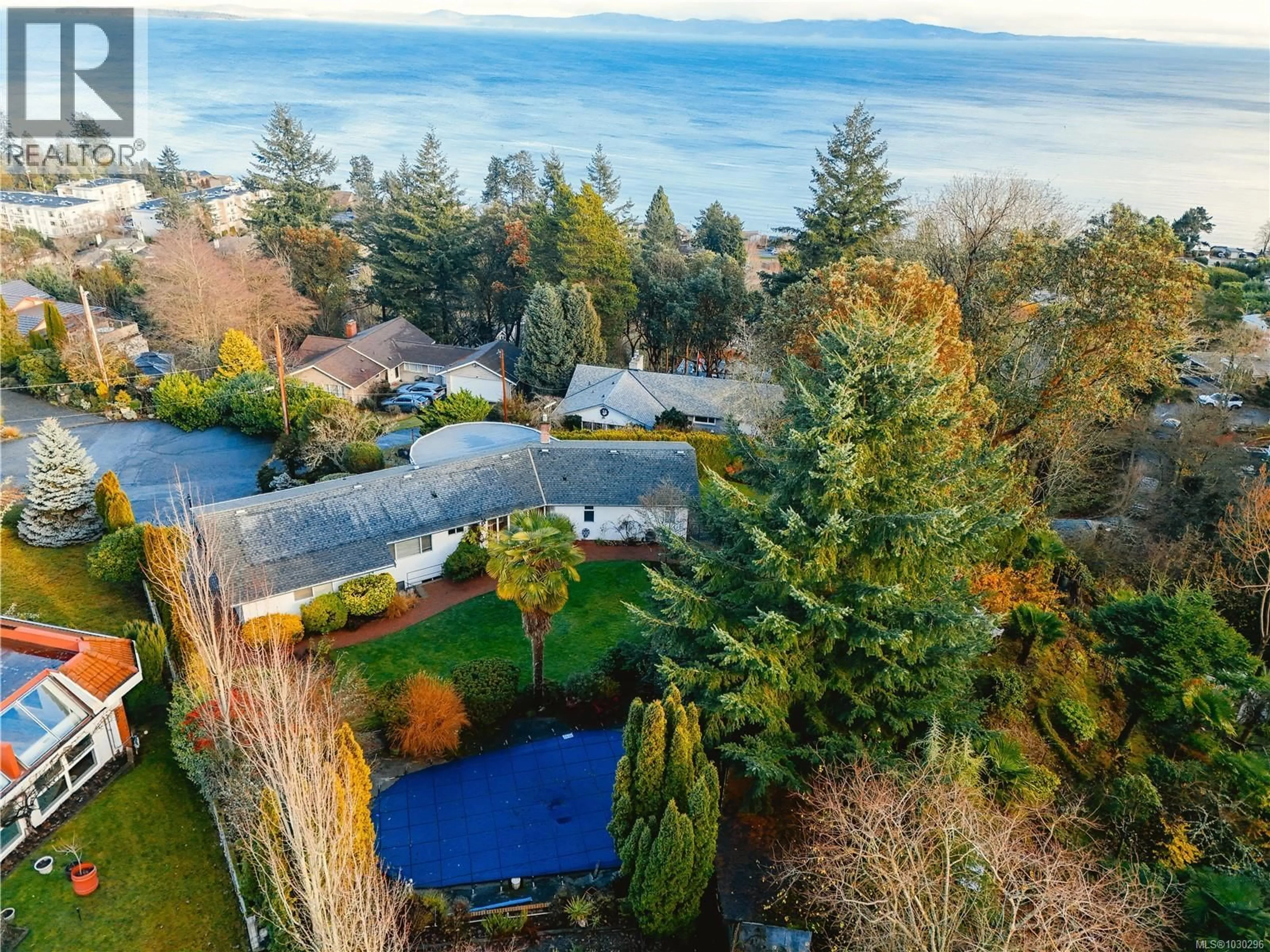 A pic from outside/outdoor area/front of a property/back of a property/a pic from drone, water/lake/river/ocean view for 5054 CATALINA TERRACE, Saanich British Columbia V8Y2A5